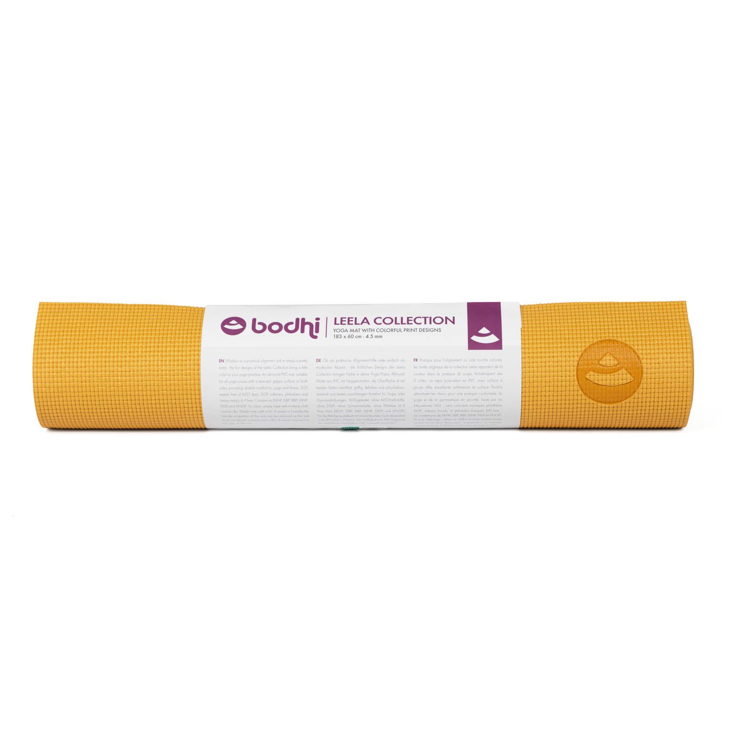 Opgerolde, gele yogamat met verpakking. Op de verpakking staat 'bodhi' en 'LEELA COLLECTION'.