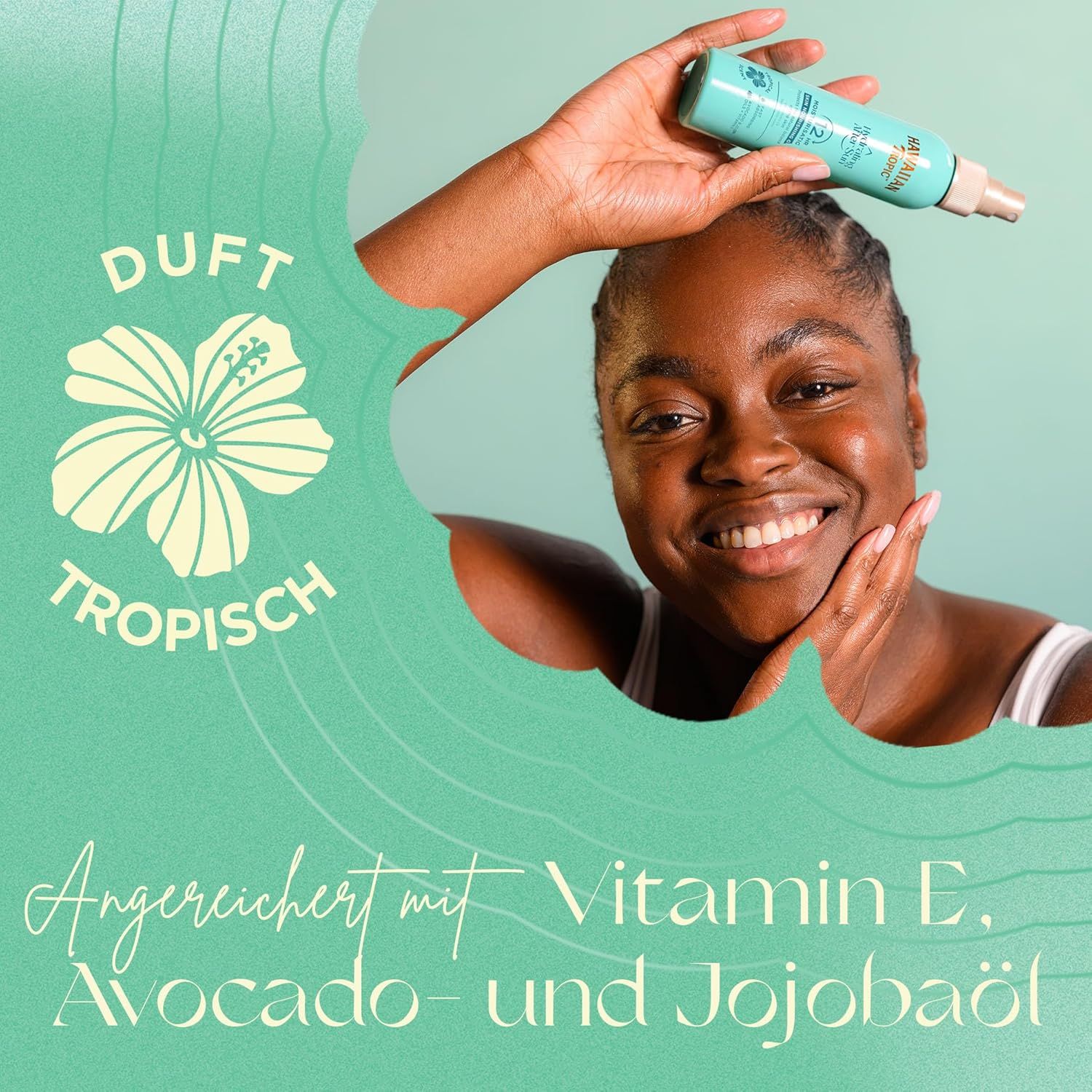 Femme souriante tenant un flacon pulvérisateur. Texte: Parfum tropical, Enrichi en vitamine E, huile d'avocat et de jojoba.