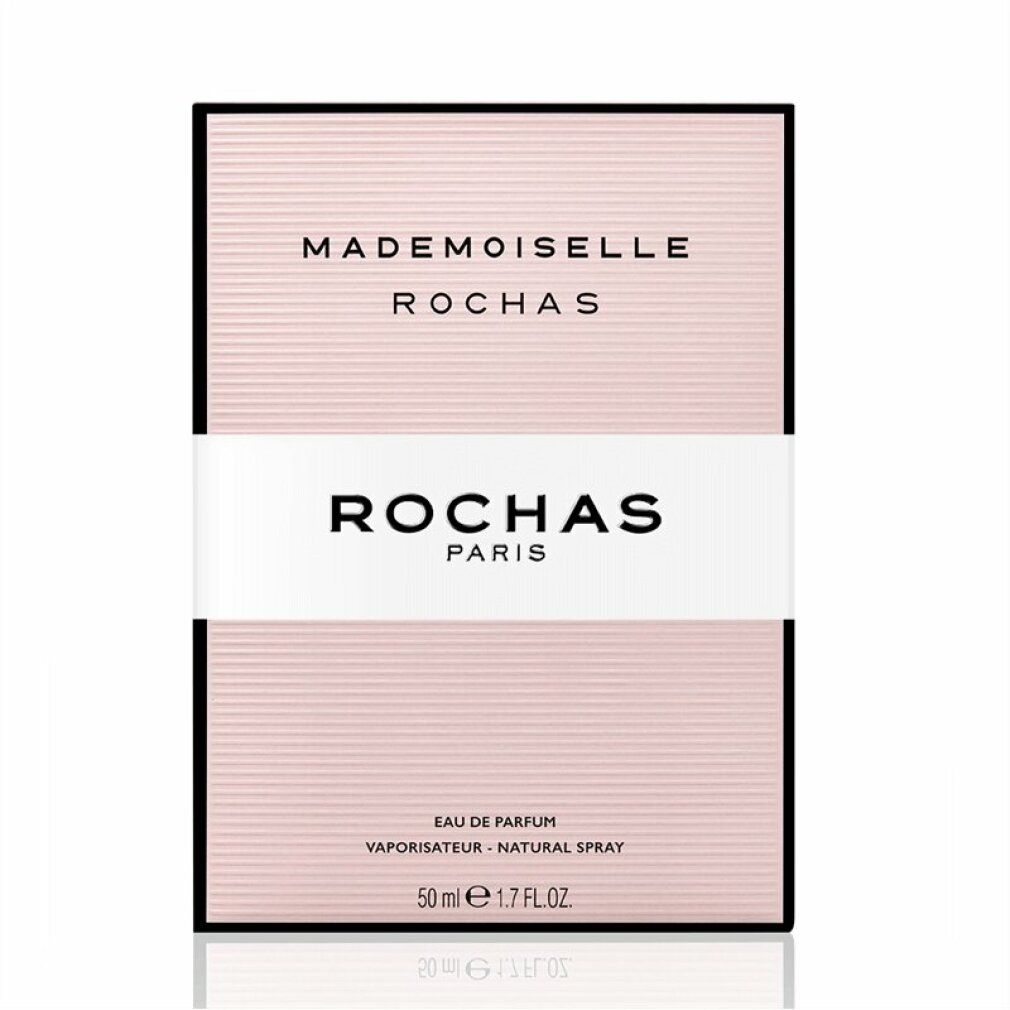 Boîte rose avec texte Mademoiselle Rochas, Eau de Parfum, 50 ml. Cadre noir, bande blanche.