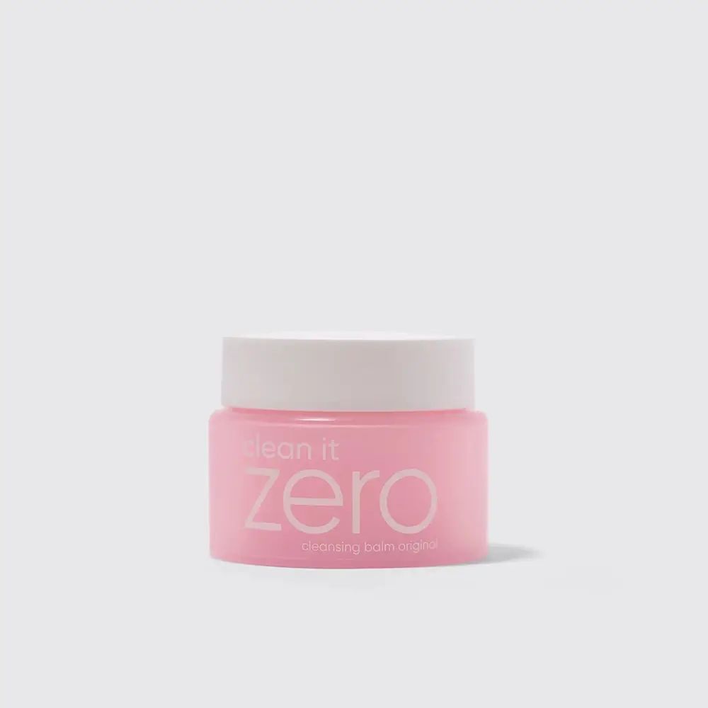 Pot rose avec couvercle blanc. Inscription : clean it zero cleansing balm original.