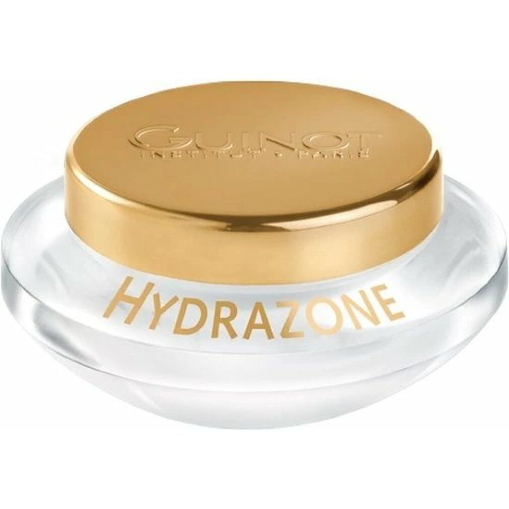 Ronde pot met gouden deksel. Opschrift: GUINOT, HYDRAZONE. Transparante houder.