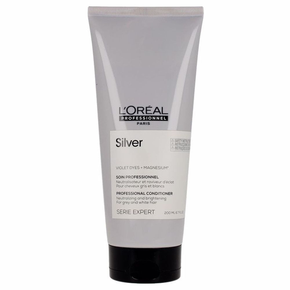 Tube argentée avec bouchon noir. Inscription : L'Oréal Professionnel, Silver, Professional Conditioner. Pour cheveux gris et blancs.