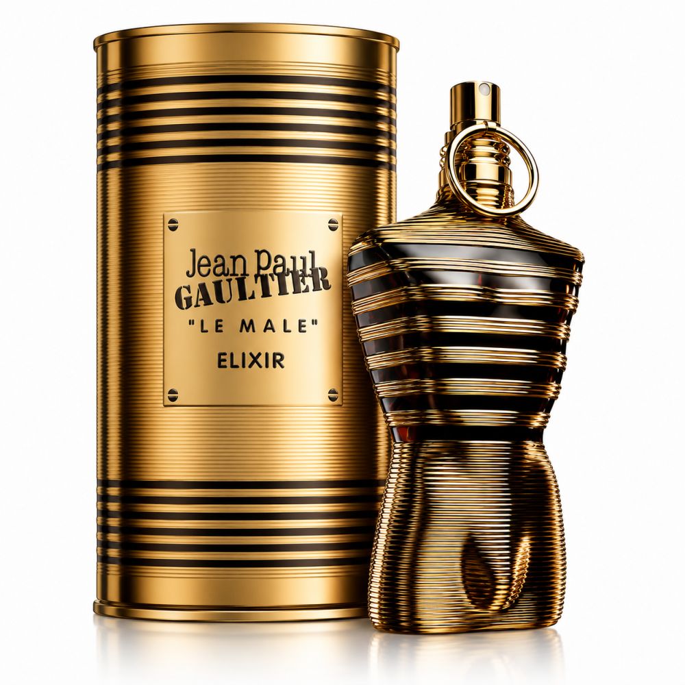 Boîte dorée à rayures noires, étiquette 'Jean Paul Gaultier LE MALE ELIXIR'. Le flacon assorti est à côté.