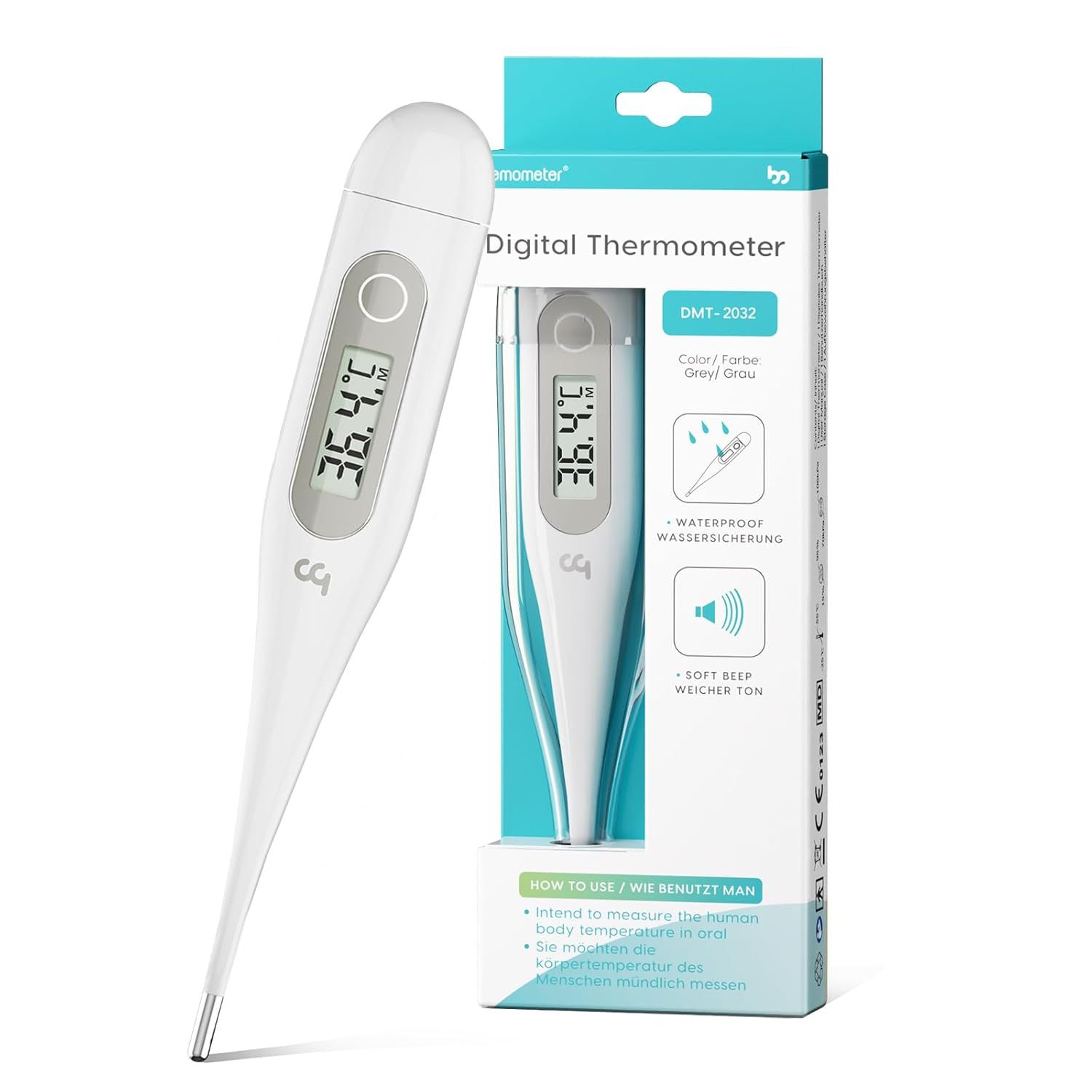 Digitale thermometer in verpakking. Witte thermometer met display, toont 36,4°C. Verpakking met productinformatie.