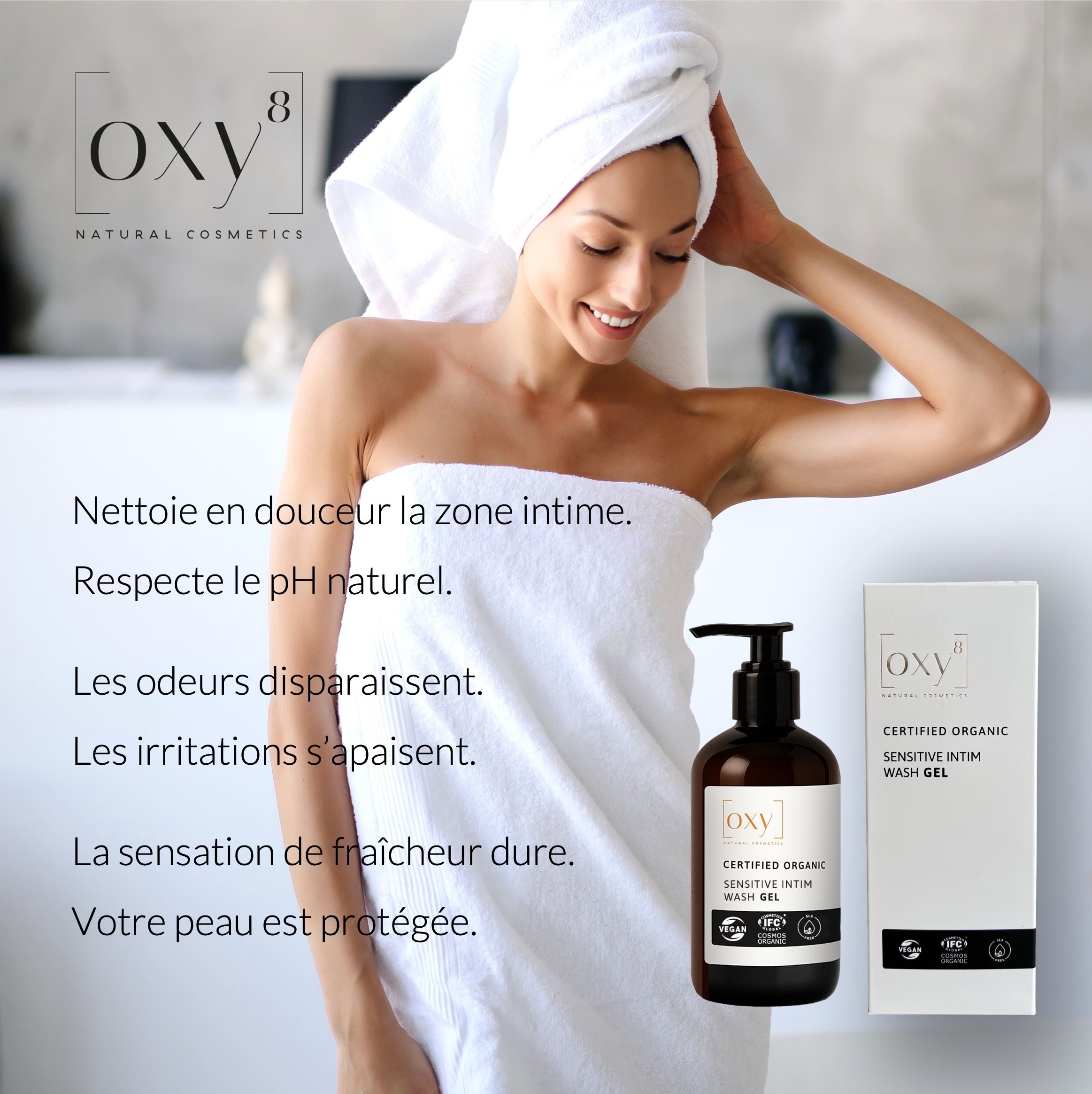 Femme avec une serviette, à côté flacon avec pompe et emballage produit avec inscription: oxy8, SENSITIVE INTIM WASH GEL.