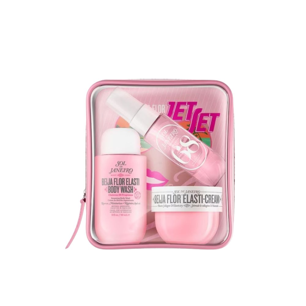 Trousse de toilette rose avec trois produits Sol de Janeiro : gel douche, crème et gloss. Tous les produits sont roses.