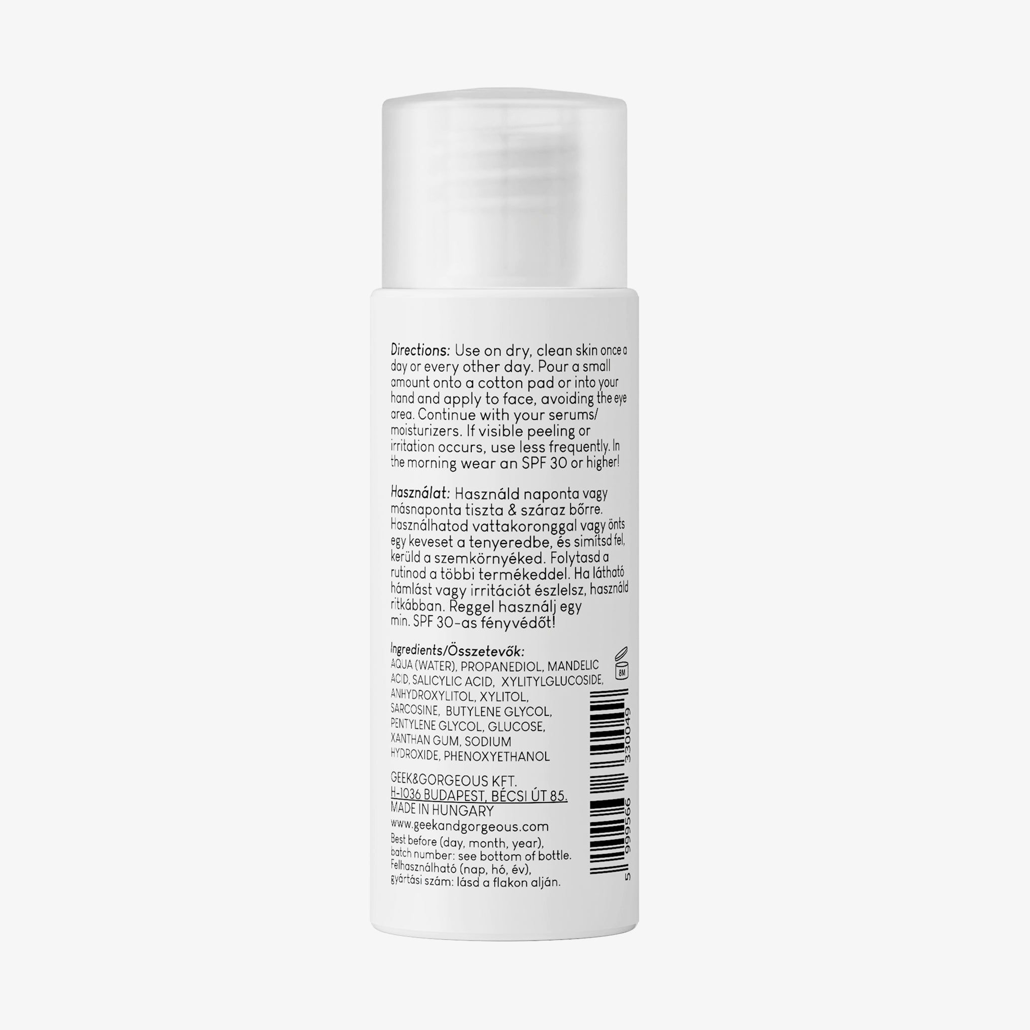 Achterkant van een witte fles. Tekst: Gebruiksaanwijzing, ingrediënten, Geek & Gorgeous-adres, barcode.