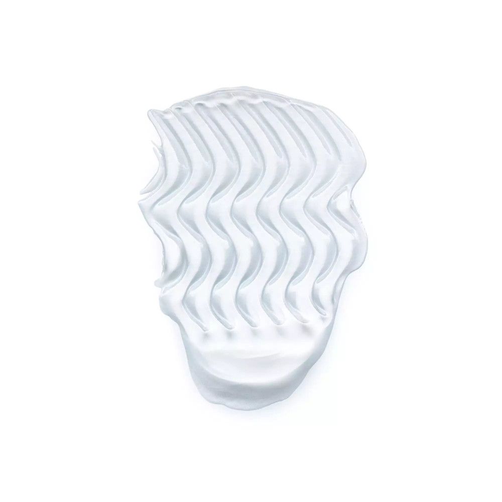 Gel blanc ondulé sur fond blanc. Démonstration de texture.