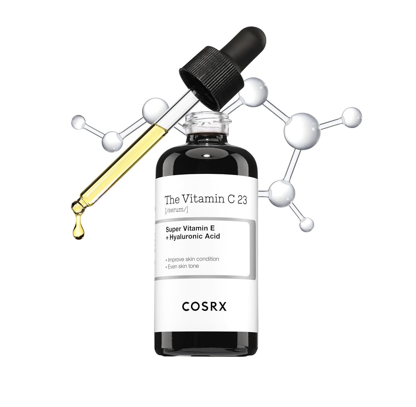 Flacon en verre foncé avec bouchon noir et pipette. Inscription : The Vitamin C 23 Serum, COSRX. Liquide jaune s'écoulant de la pipette.