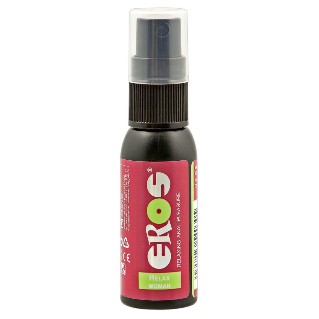 Zwarte fles met verstuiver. Opschrift EROS, Relax Woman. Rode en groene etiketten.