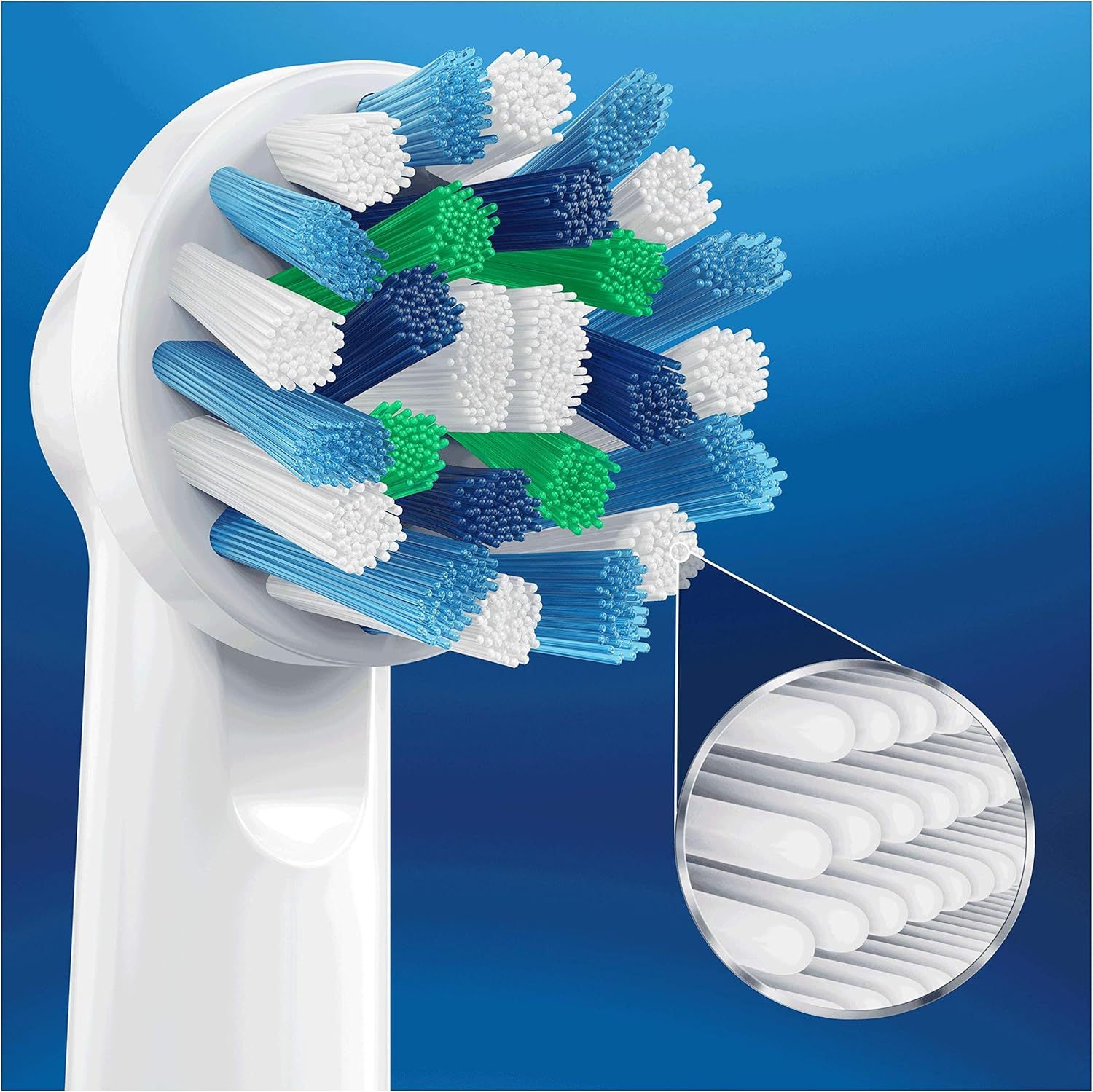 Close-up van de borstelkop van een Oral-B elektrische tandenborstel met detail van de borstelharen.