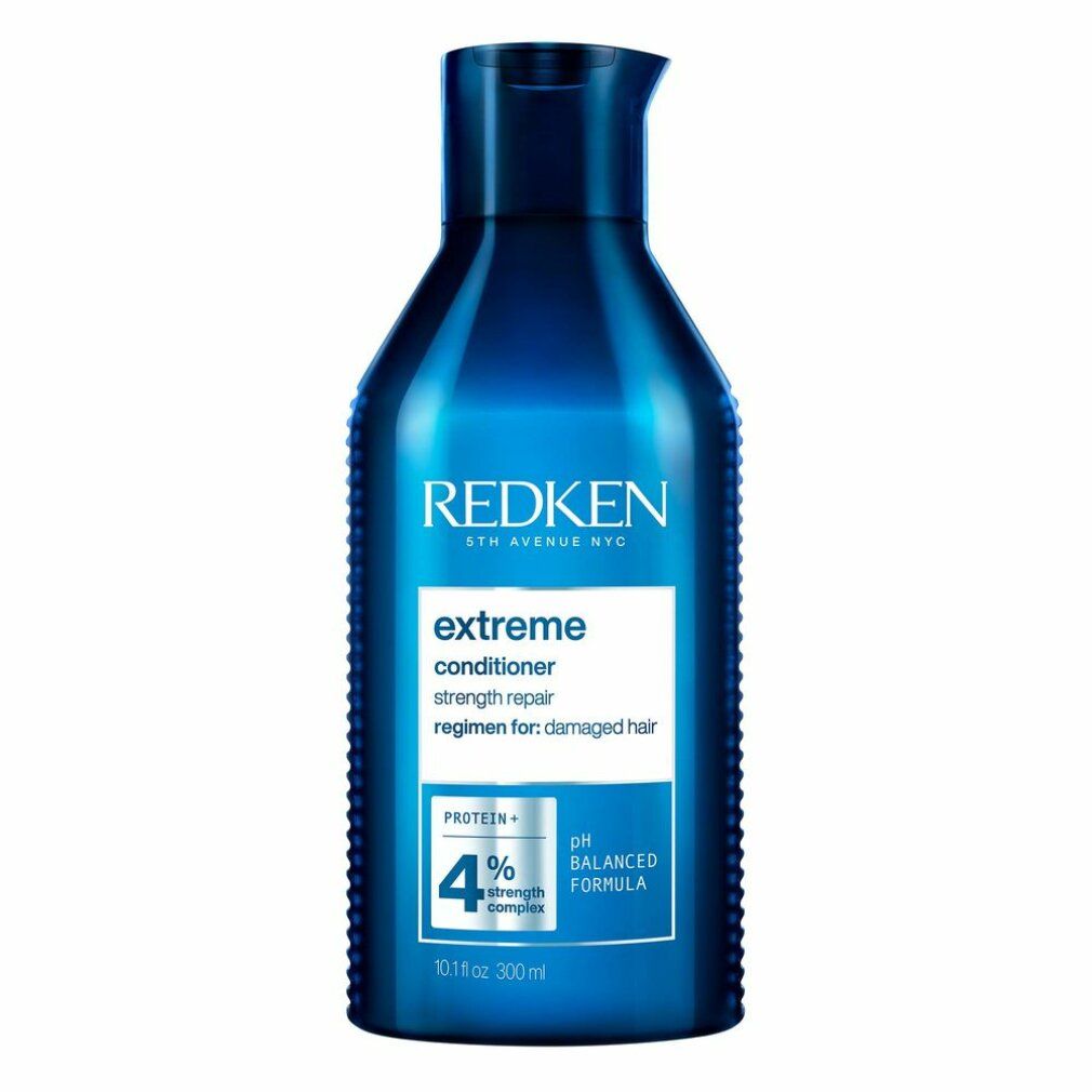 Donkerblauwe fles Redken Extreme Conditioner. Opschrift: Extreme, Conditioner, pH Balanced Formula. 300ml.