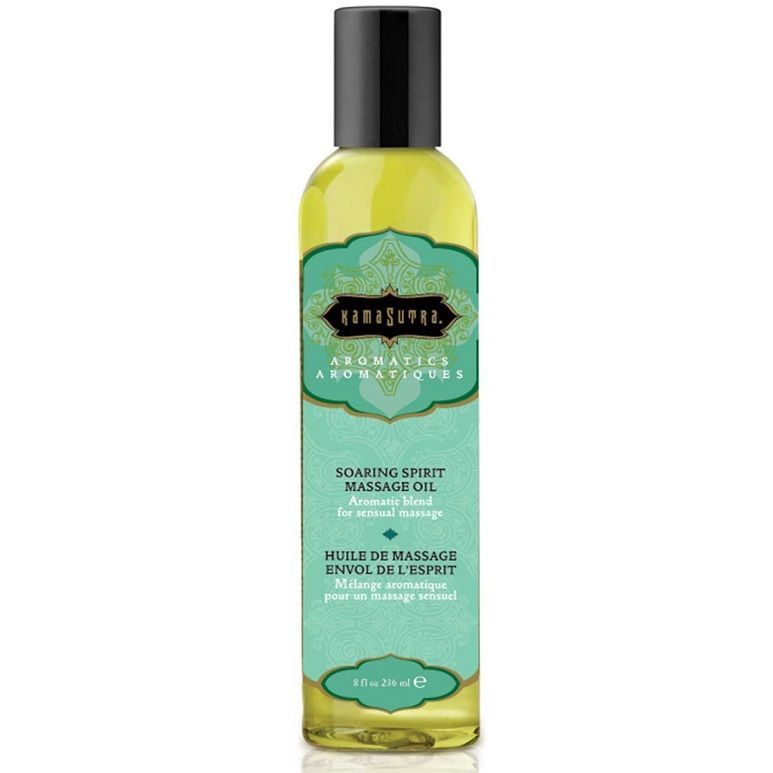 Bouteille d'huile de massage Kamasutra Aromatics avec bouchon noir. Huile jaune pâle dans un récipient transparent.