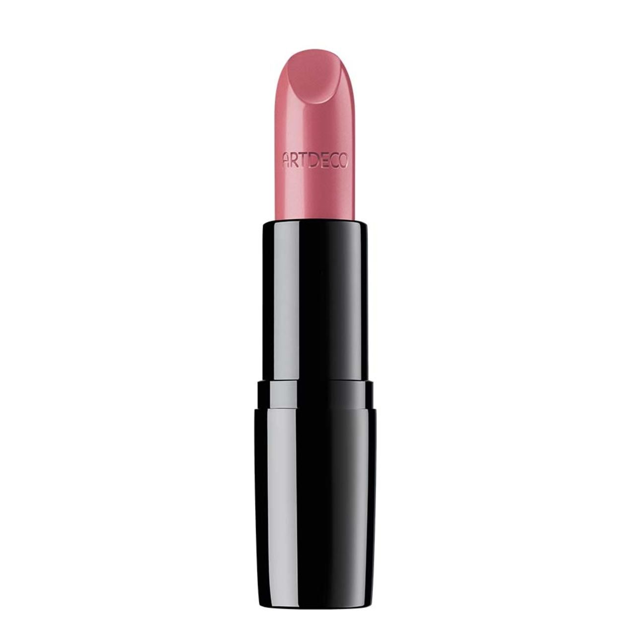 Artdeco Perfect Color Lipstick roze. Zwarte huls, zilveren ring, roze lipstickpunt.