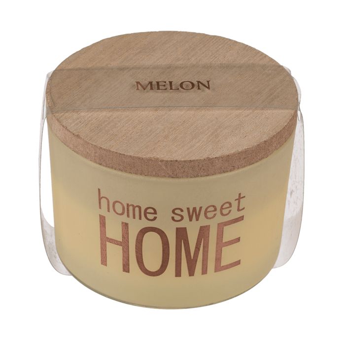 Gele geurkaars met houten deksel. Opschrift "home sweet HOME". Deksel met "MELOEN".