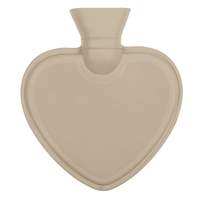 Bouillotte beige en forme de cœur. Caoutchouc, surface nervurée, col. Sans housse.