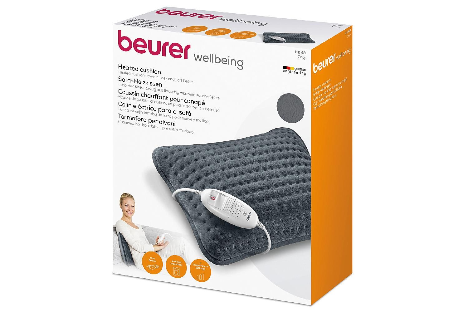 Coussin chauffant dans son emballage. Gris, rectangulaire, avec câble et commande. Marque Beurer.