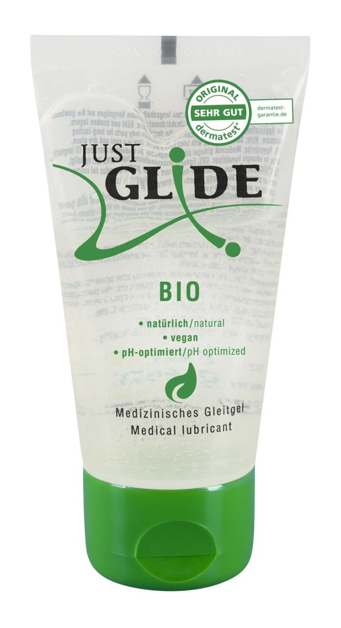 Tube de lubrifiant avec bouchon vert. Inscription : Just Glide. Végétalien et pH optimisé. Lubrifiant.