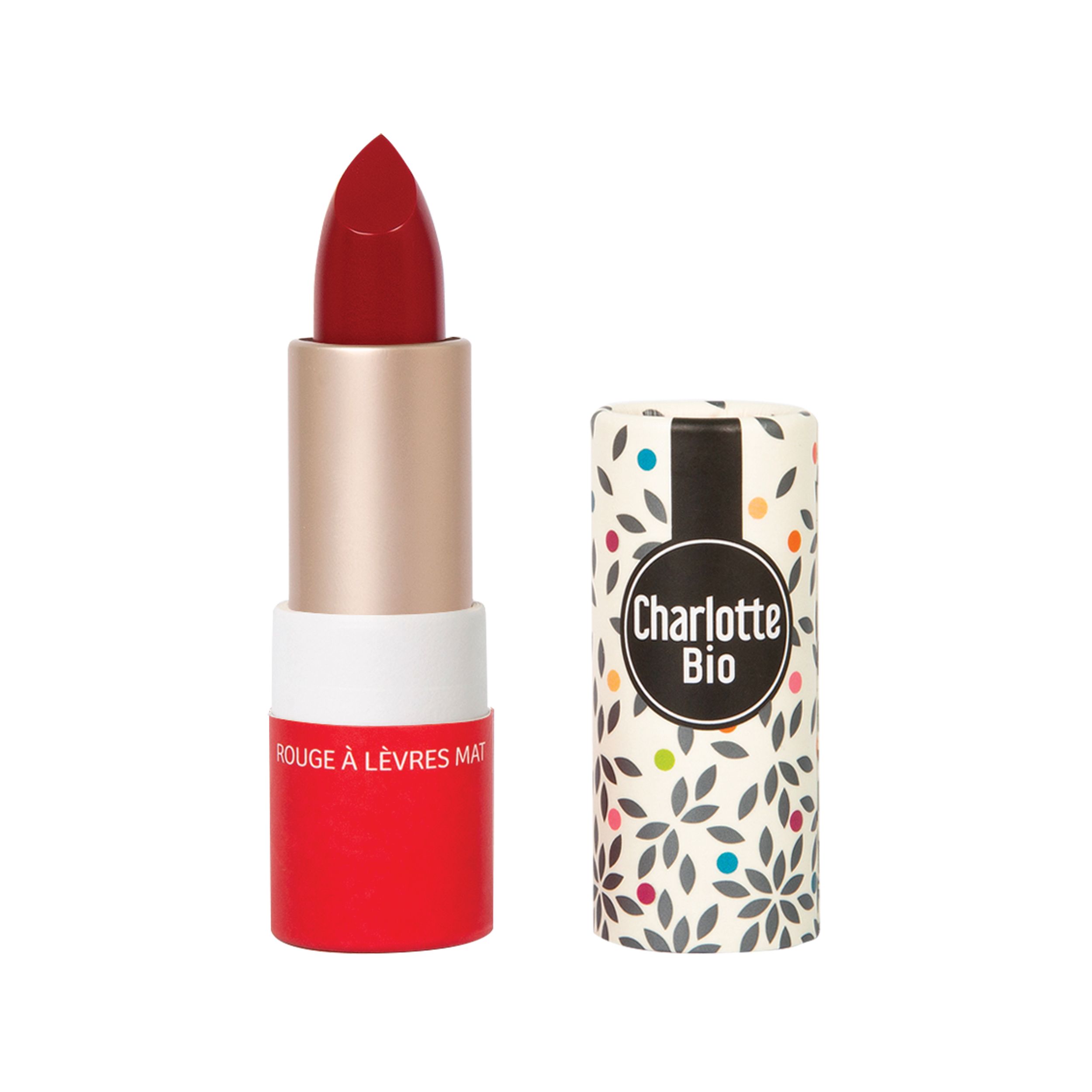 Rode matte lipstick. Gouden huls, rode basis. Daarnaast de huls met logo en bloemmotief.