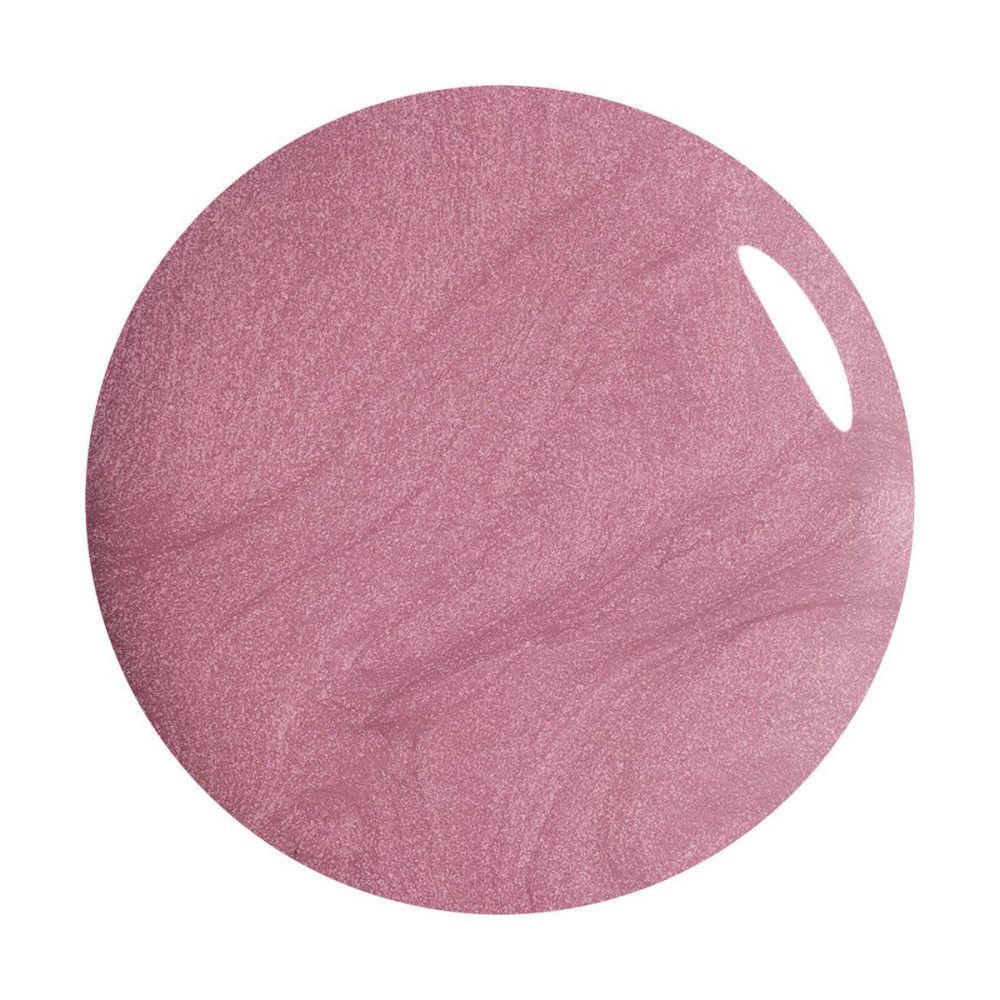Tache ronde de vernis à ongles rose. Surface brillante.