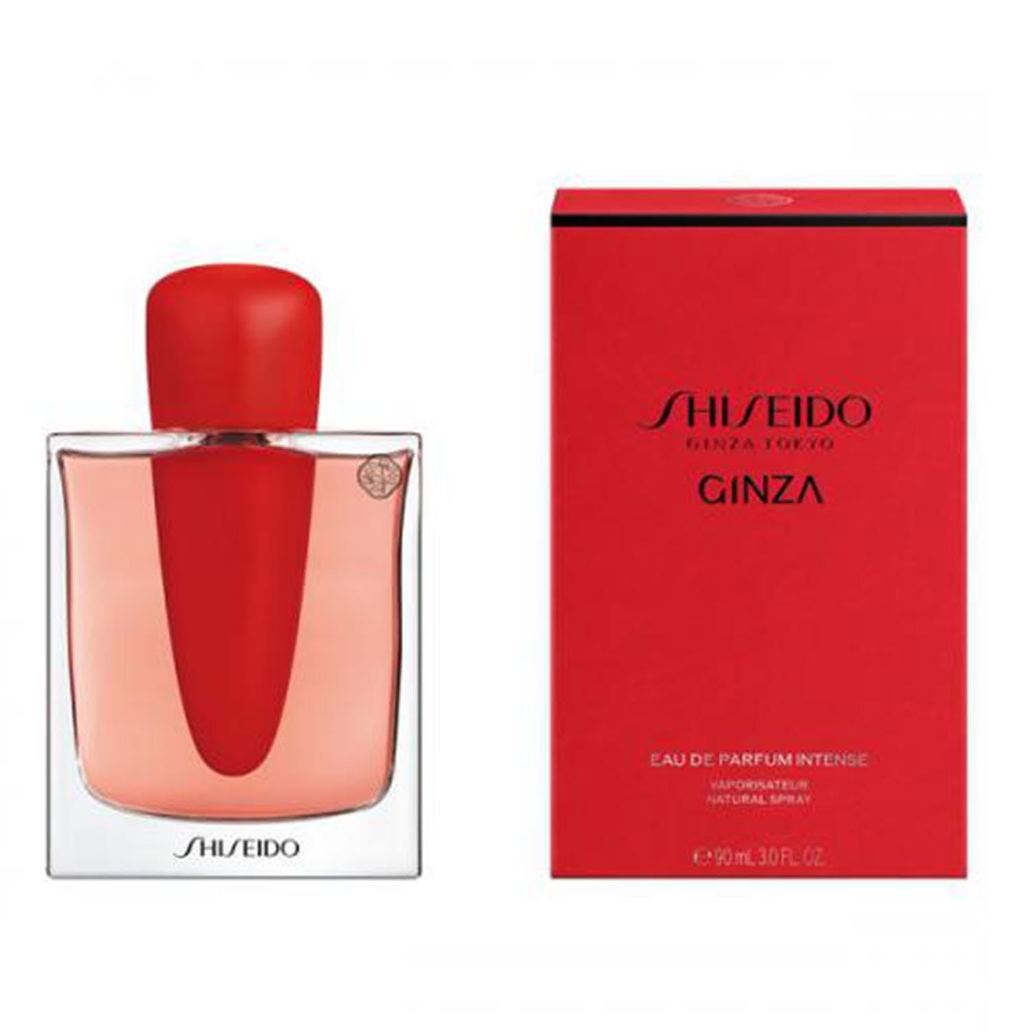 Flacon de parfum et boîte rouge. Flacon avec bouchon rouge et liquide rose. Boîte avec logo Shiseido Ginza.