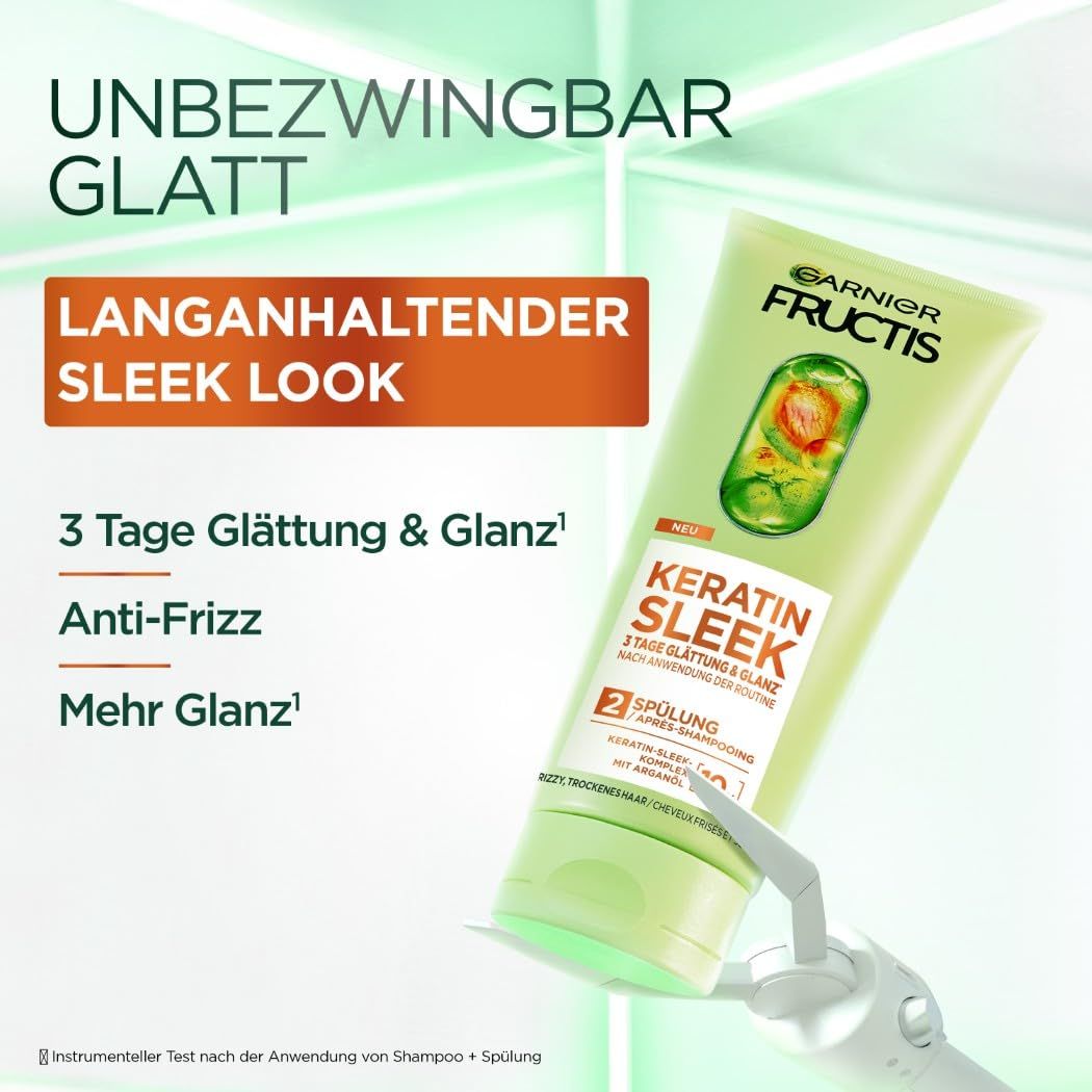 Garnier Fructis Keratin Sleek Conditioner. Groene tube met oranje label. Tekst: 3 dagen glad & glans, anti-frizz.