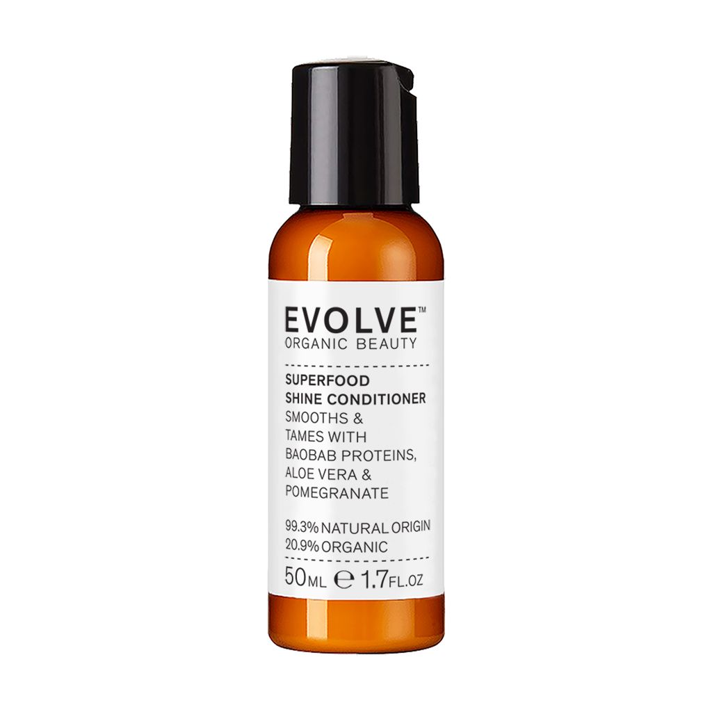 Bouteille orange avec bouchon rabattable noir. Evolve Organic Beauty Superfood Shine Conditioner, 50ml.