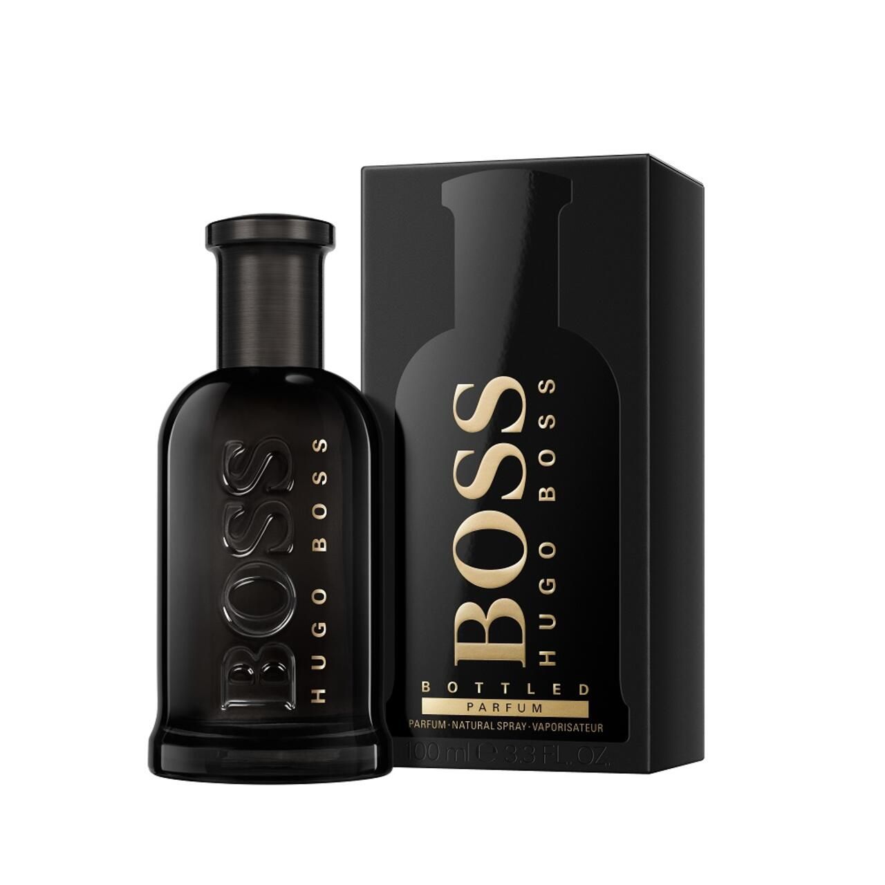 Zwarte fles met gouden belettering BOSS HUGO BOSS. Zwarte verpakking met productafbeelding en belettering.