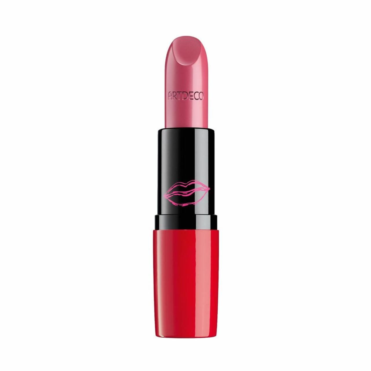 Roze lipstick met rode huls, zwart middendeel met lippenontwerp. Artdeco-opschrift zichtbaar.