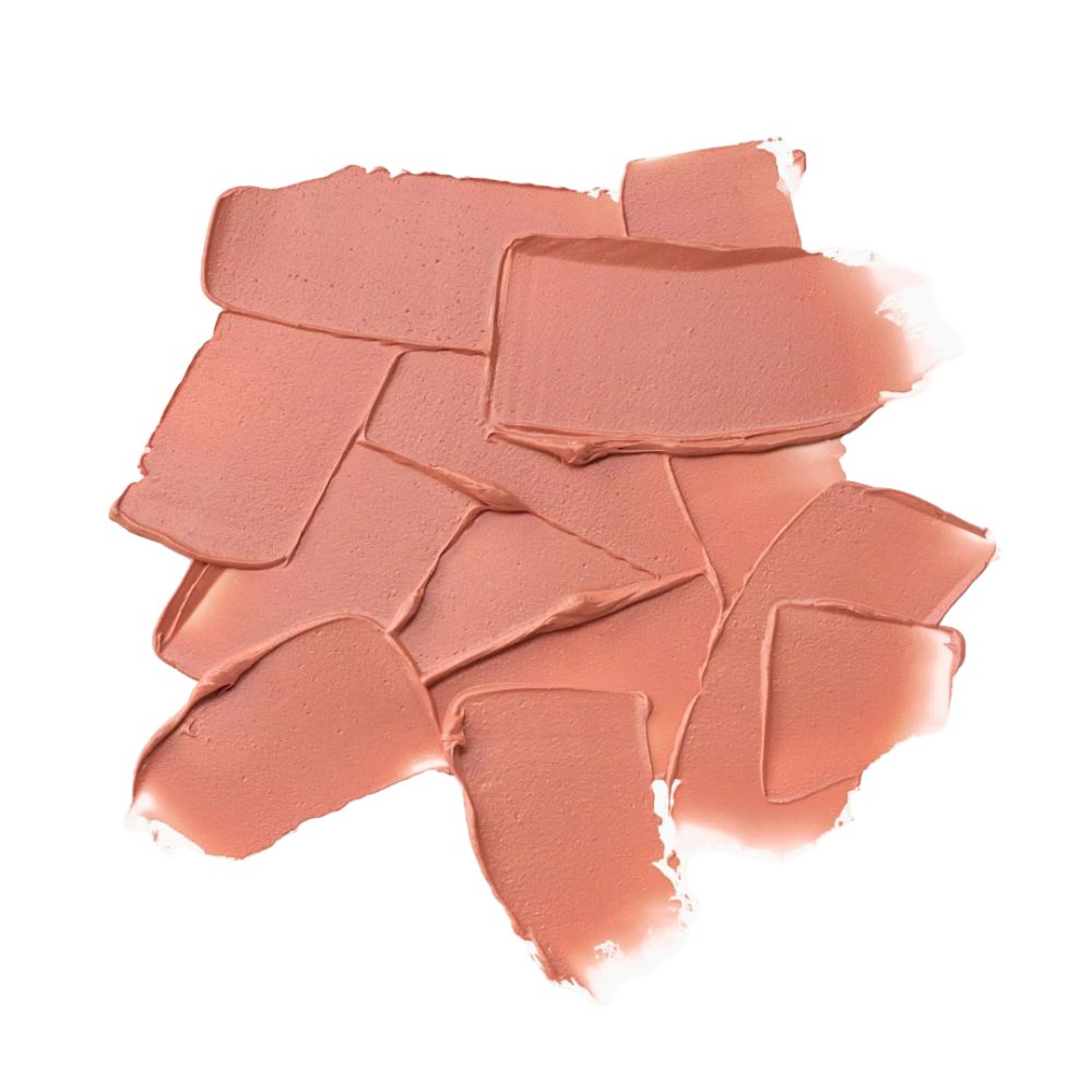 Tas de taches de couleur de baume à lèvres. La couleur est un rose clair.