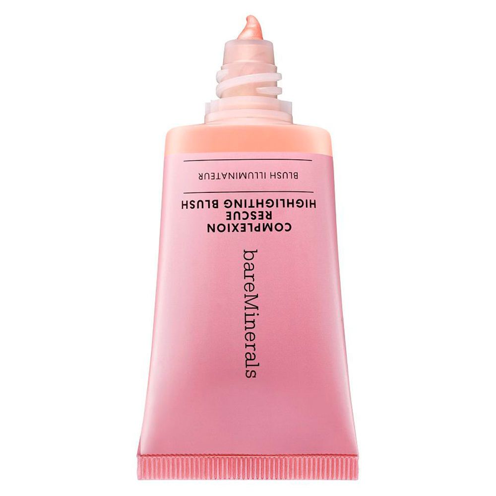 Roze tube met product. Opschrift: COMPLEXION RESCUE HIGHLIGHTING BLUSH, bareMinerals. Uitloop met product.