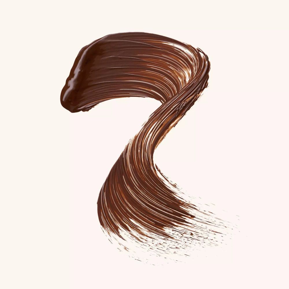 Texture de mascara marron, appliquée en forme de vague. Surface brillante.