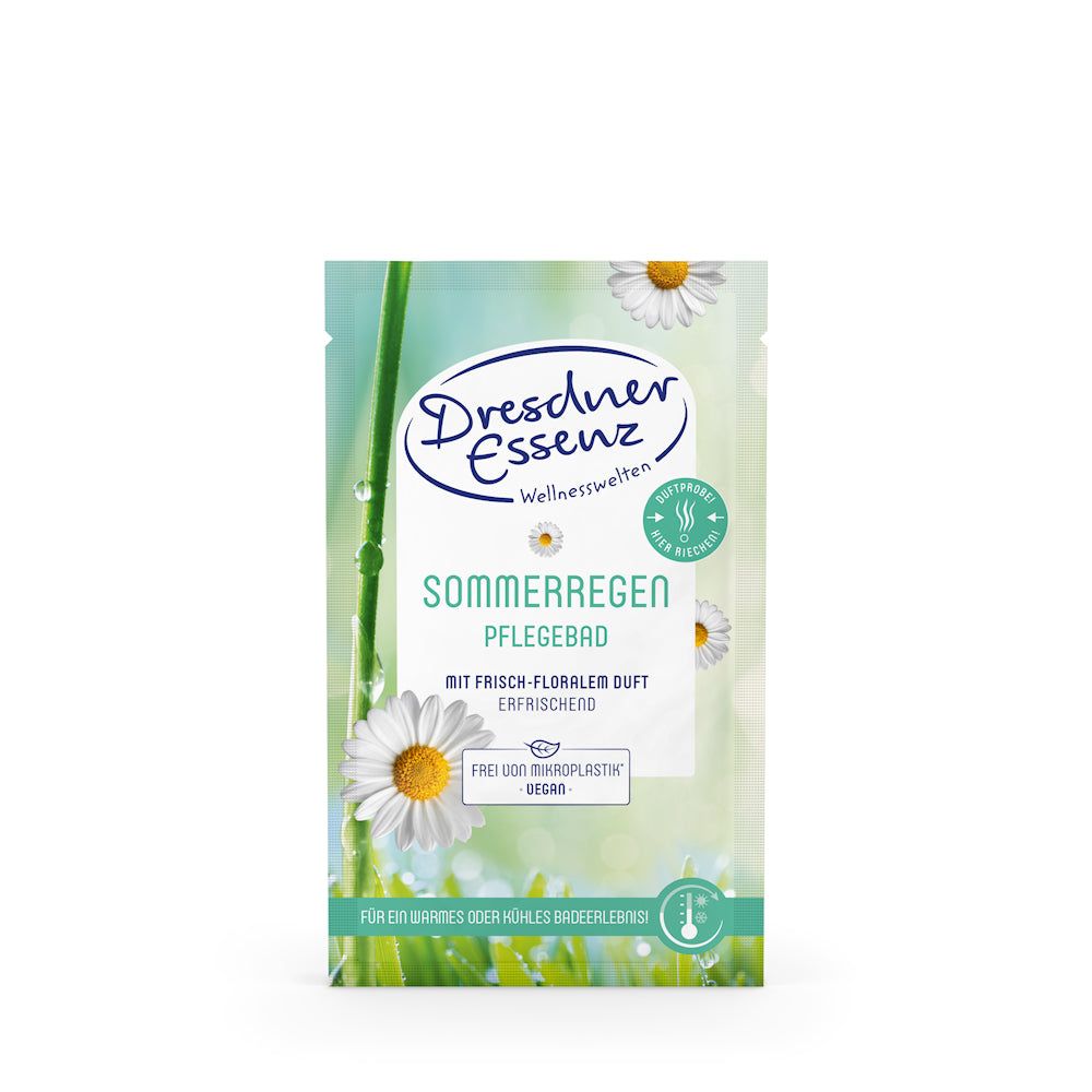 Sachet Dresdner Essenz Pflegebad Sommerregen. Texte et fleurs de camomille sur fond blanc.