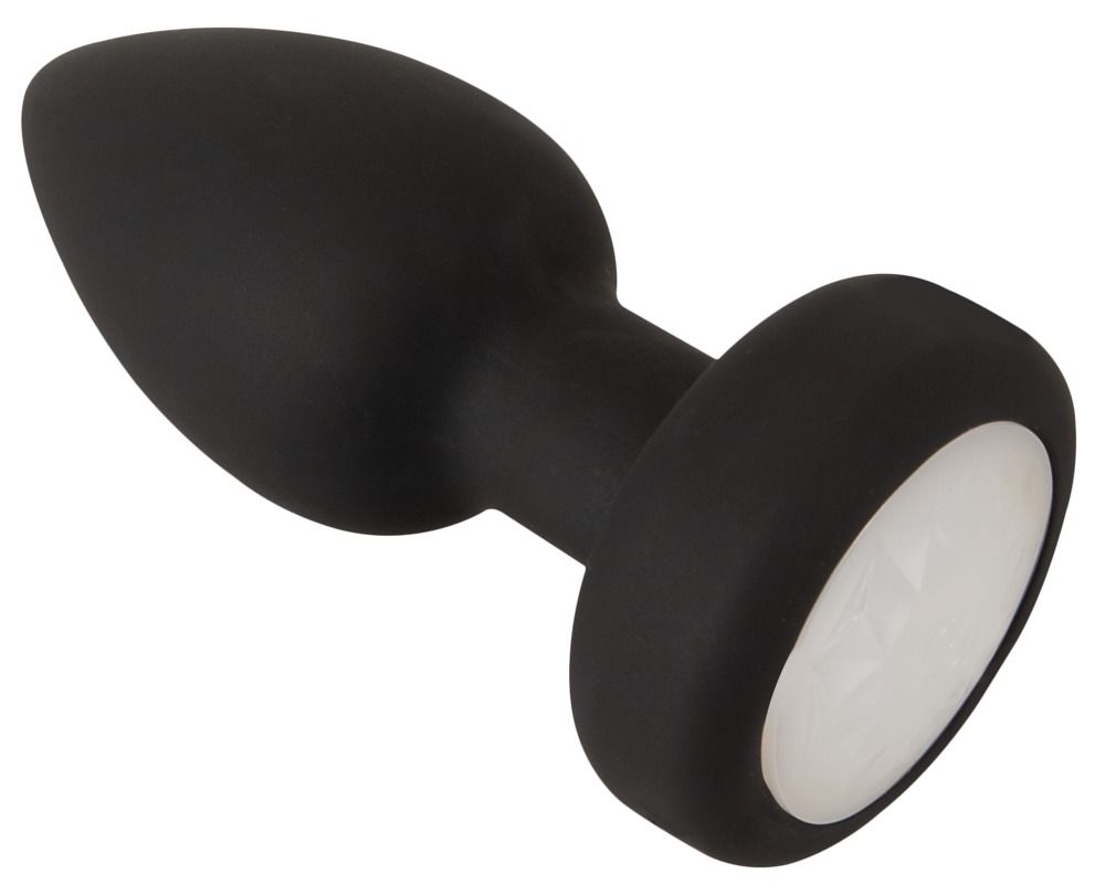 Bouchon anal noir avec base large et insert blanc.