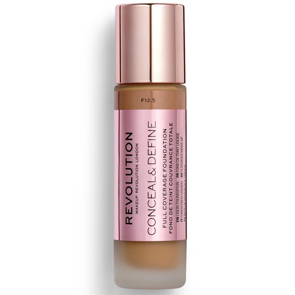 Foundationflesje. Roze etiket met "REVOLUTION" en "CONCEAL & DEFINE". Tint F12.5. Totale dekking.