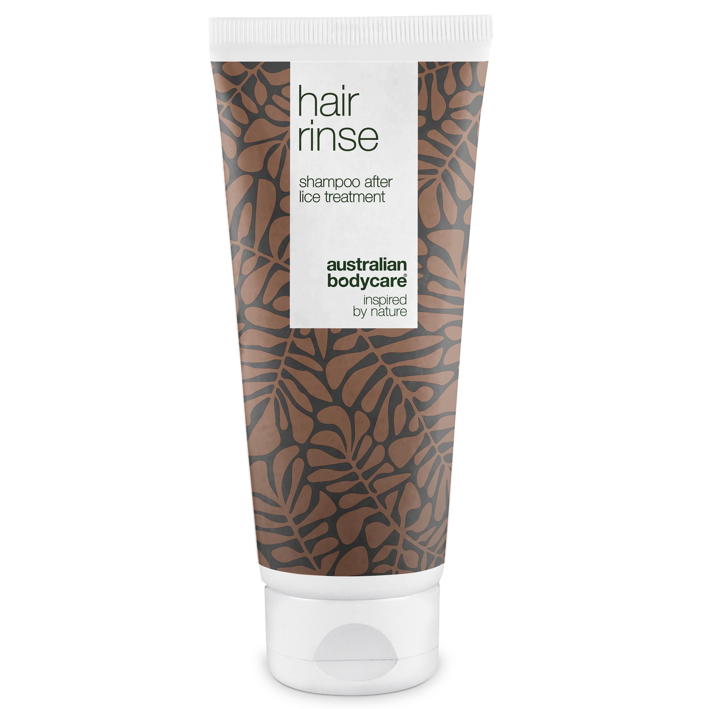 Tube de shampooing. Bouchon blanc, motif marron. Texte: Hair Rinse, Shampooing après traitement contre les poux, Australian Bodycare.