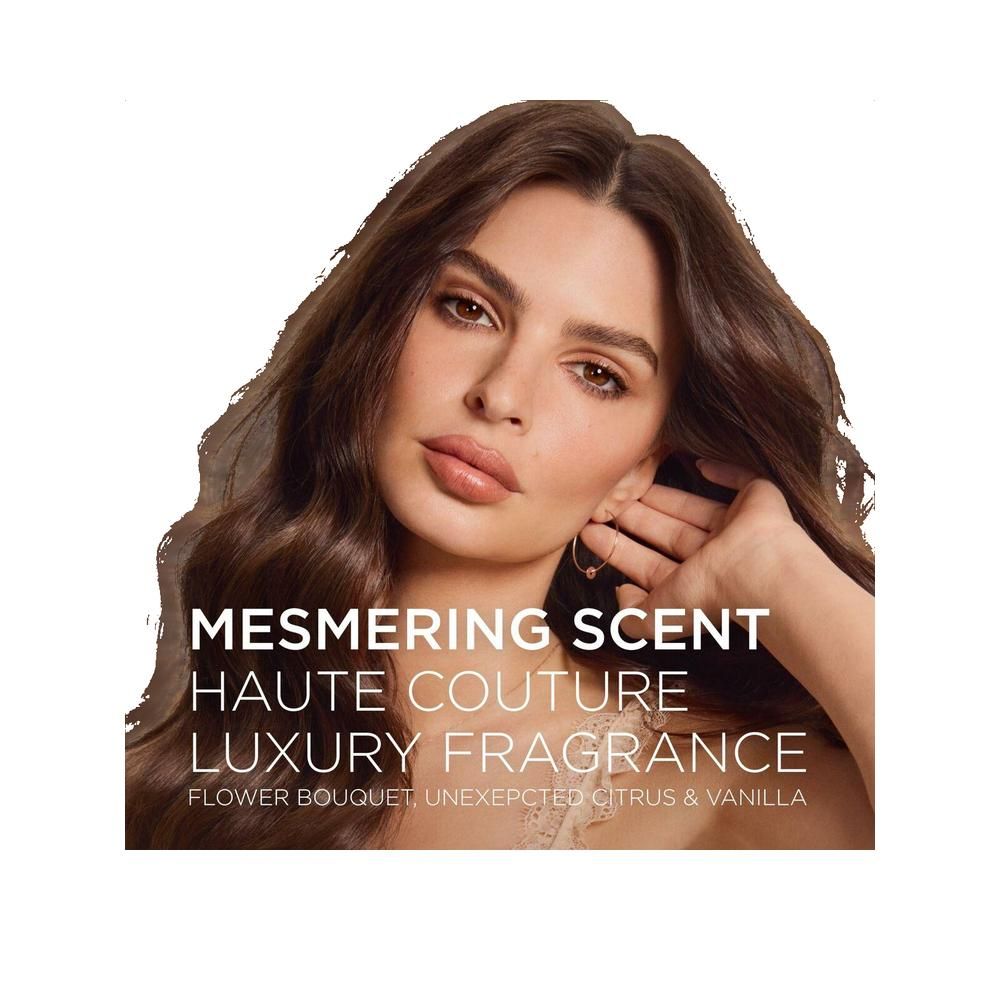 Vrouw met bruin haar. Tekst: Mesmering Scent, Haute Couture, Luxury Fragrance. Bloemenboeket, onverwachte citrus & vanille.