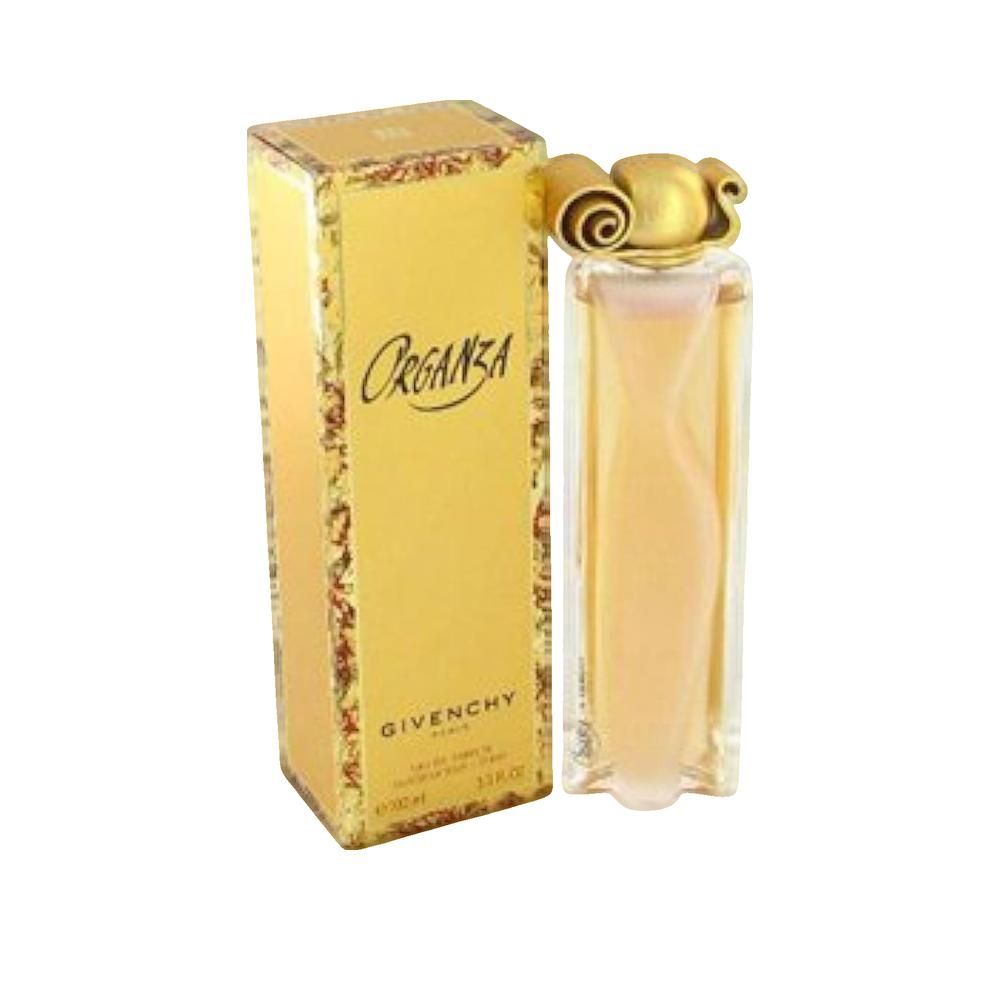 Flacon de parfum et boîte. Flacon avec bouchon doré. Boîte avec inscription Organza et Givenchy.