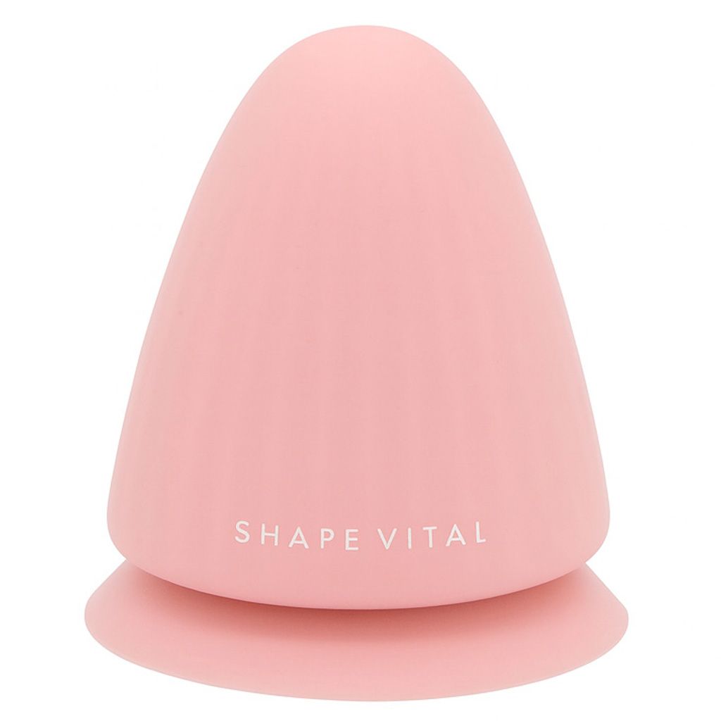 Roze, kegelvormig product met platte basis. Opschrift "SHAPE VITAL".