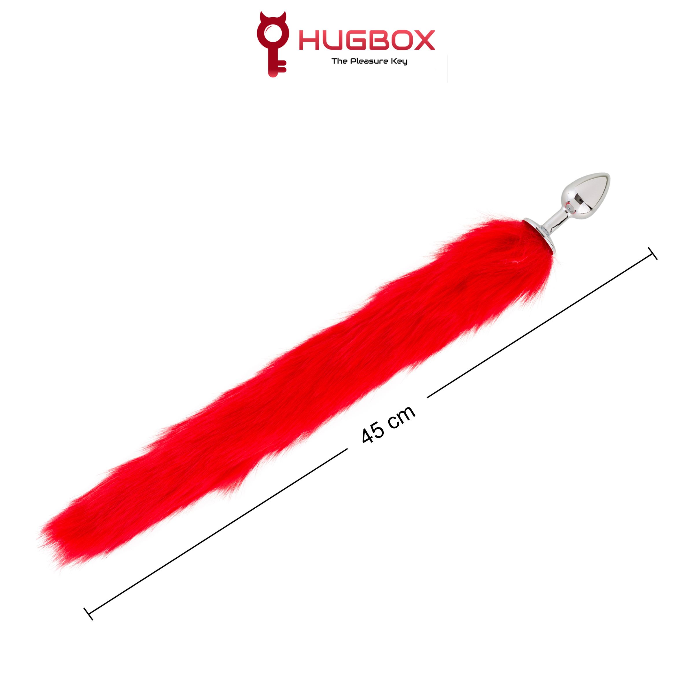 Queue rouge et duveteuse avec base métallique. Inscription: 45 cm. Logo: HUGBOX The Pleasure Key.