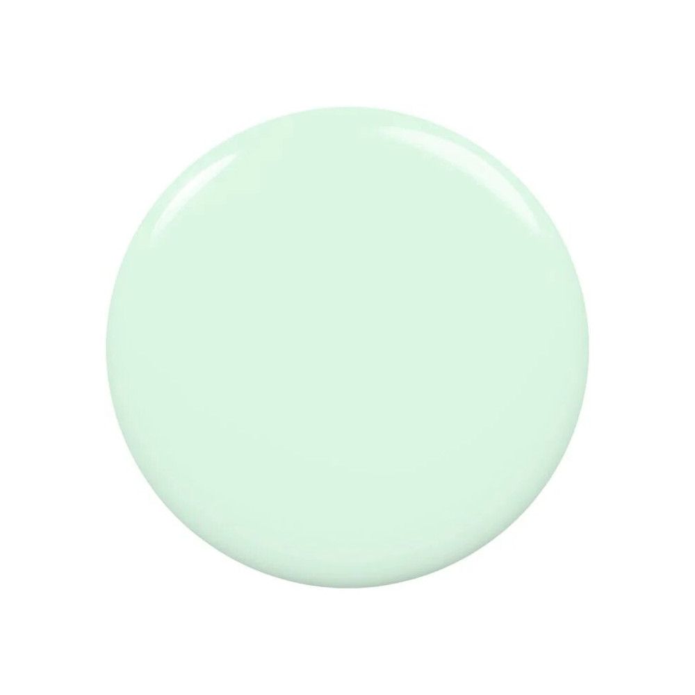 Ronde vlek pastel nagellak. Licht mintgroene kleur met glanzende afwerking.