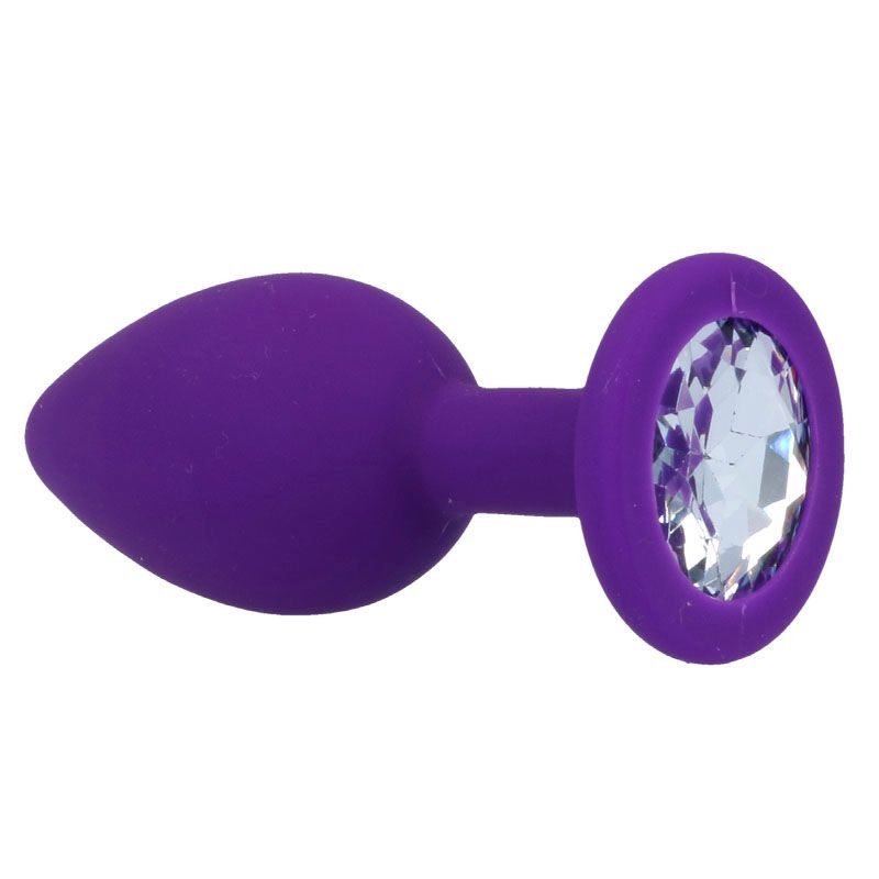 Plug anal violet en silicone avec cristal sur la bride, vue latérale.
