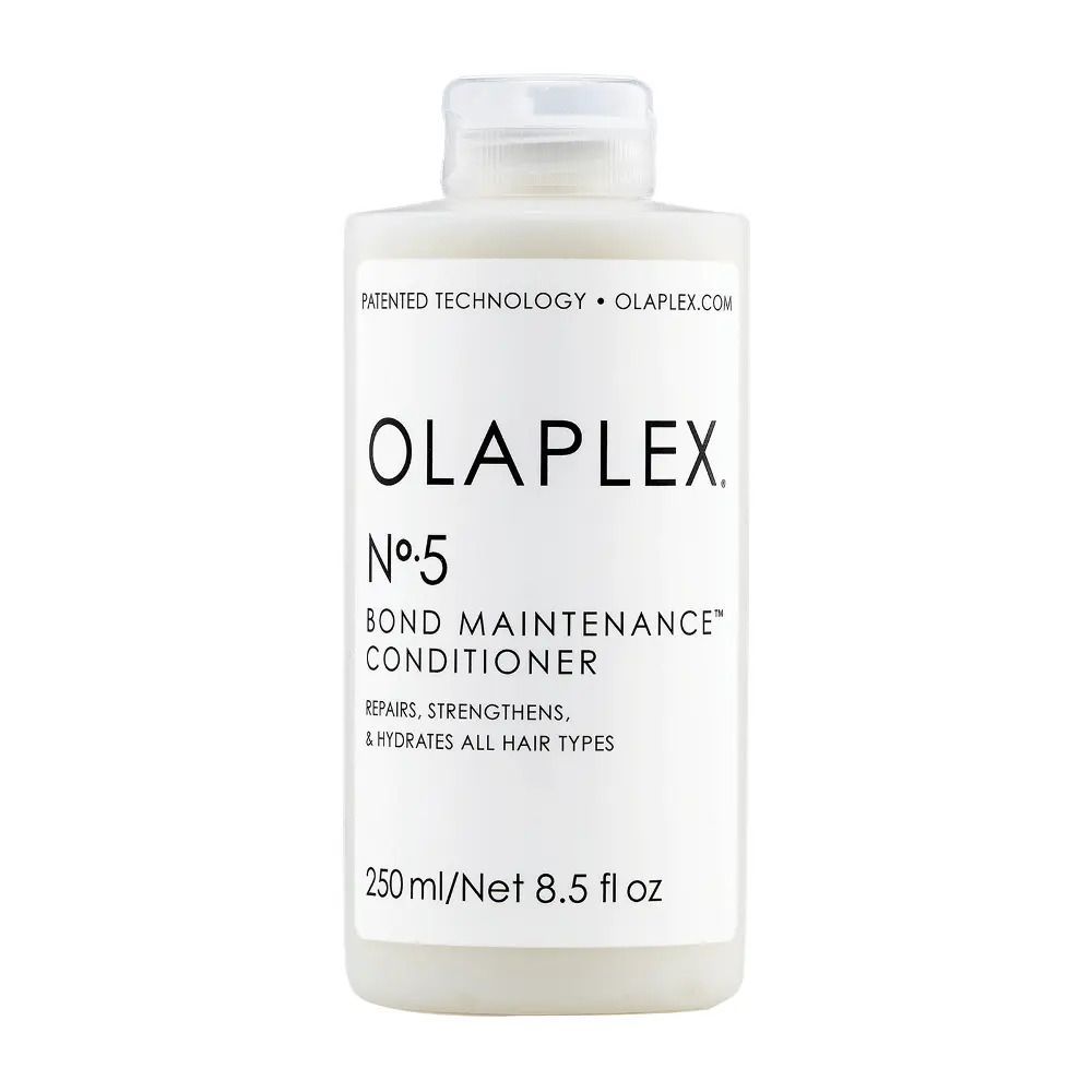 Flacon blanc Olaplex Nº5 Bond Maintenance Conditioner. Contient 250 ml/8,5 fl oz. Répare, renforce et hydrate tous types de cheveux.