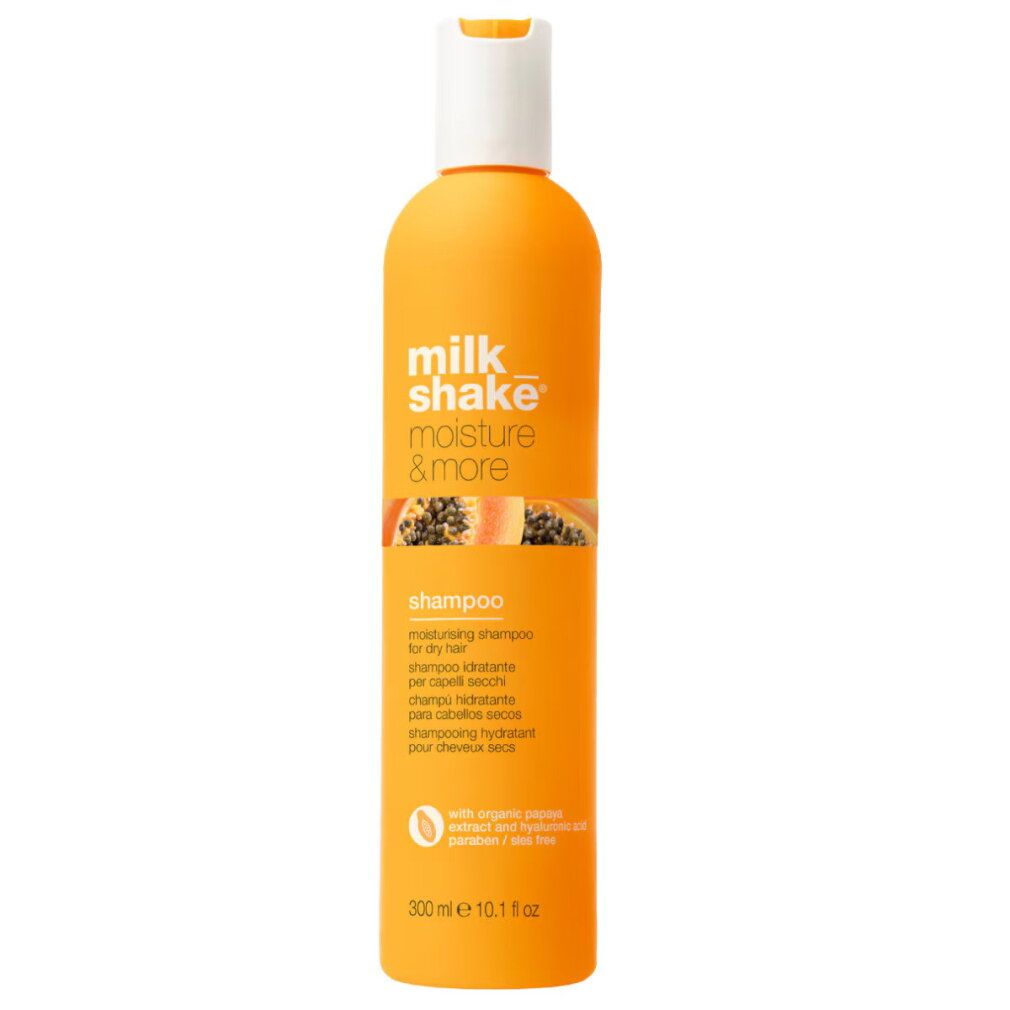 Flacon orange Milkshake Moisture & More Shampooing Hydratant avec bouchon blanc. Contient des extraits de fruits et de plantes.