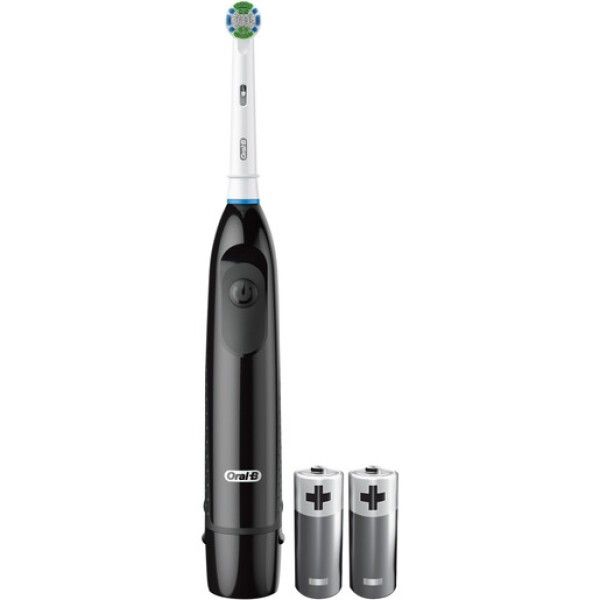 Brosse à dents électrique noire avec deux piles. La tête de brosse est blanche avec des poils verts. Un bouton marche/arrêt est sur la poignée.