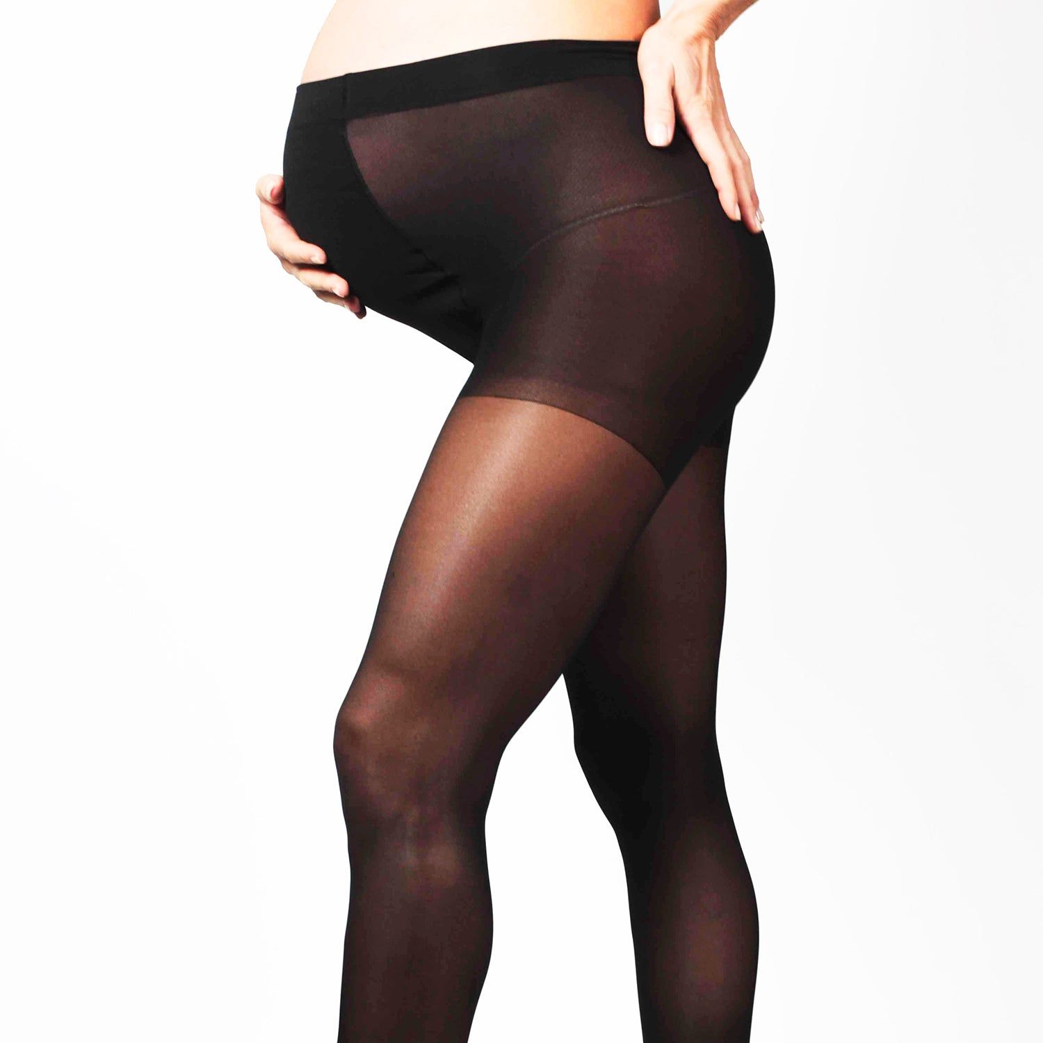 Collant de grossesse noir, compression graduée, 70 deniers. Vue latérale d'une personne avec un ventre de grossesse.