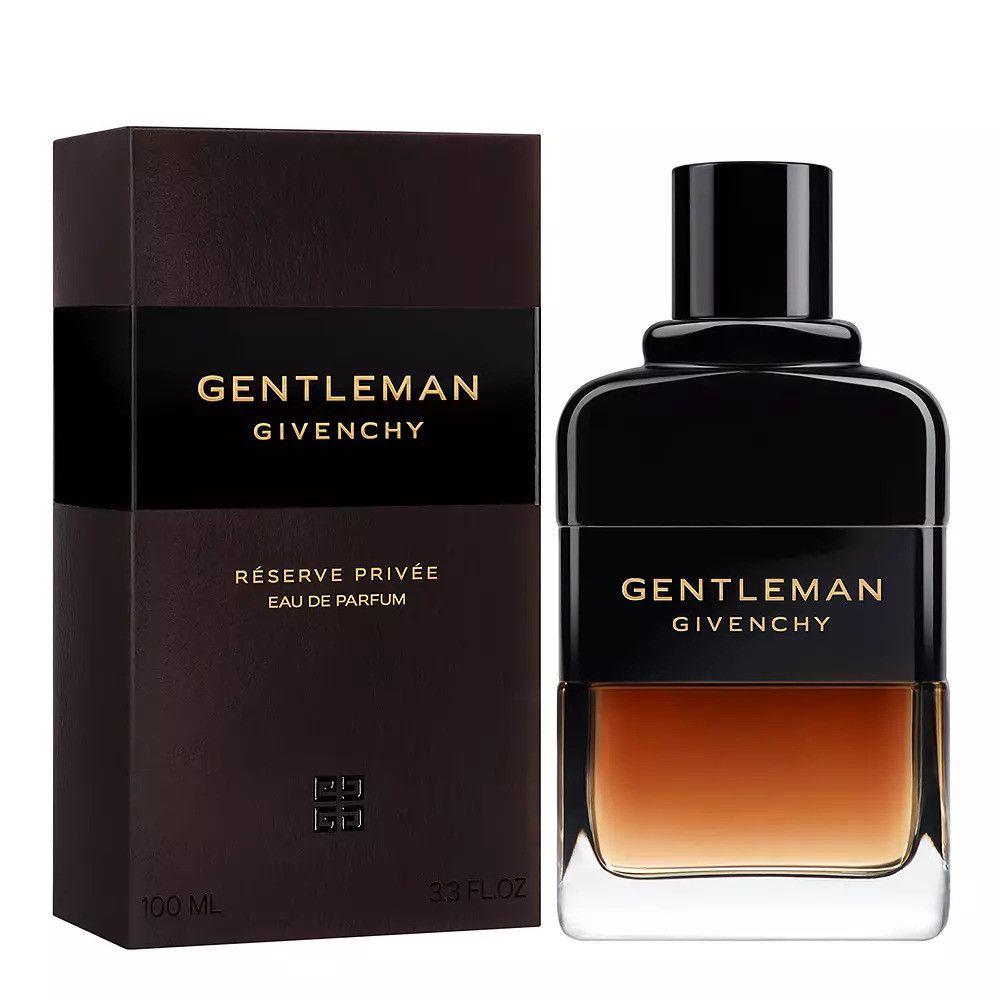 Parfumfles en verpakking. Fles met zwarte dop en bruine vloeistof. Verpakking met gouden tekst: GENTLEMAN Givenchy.