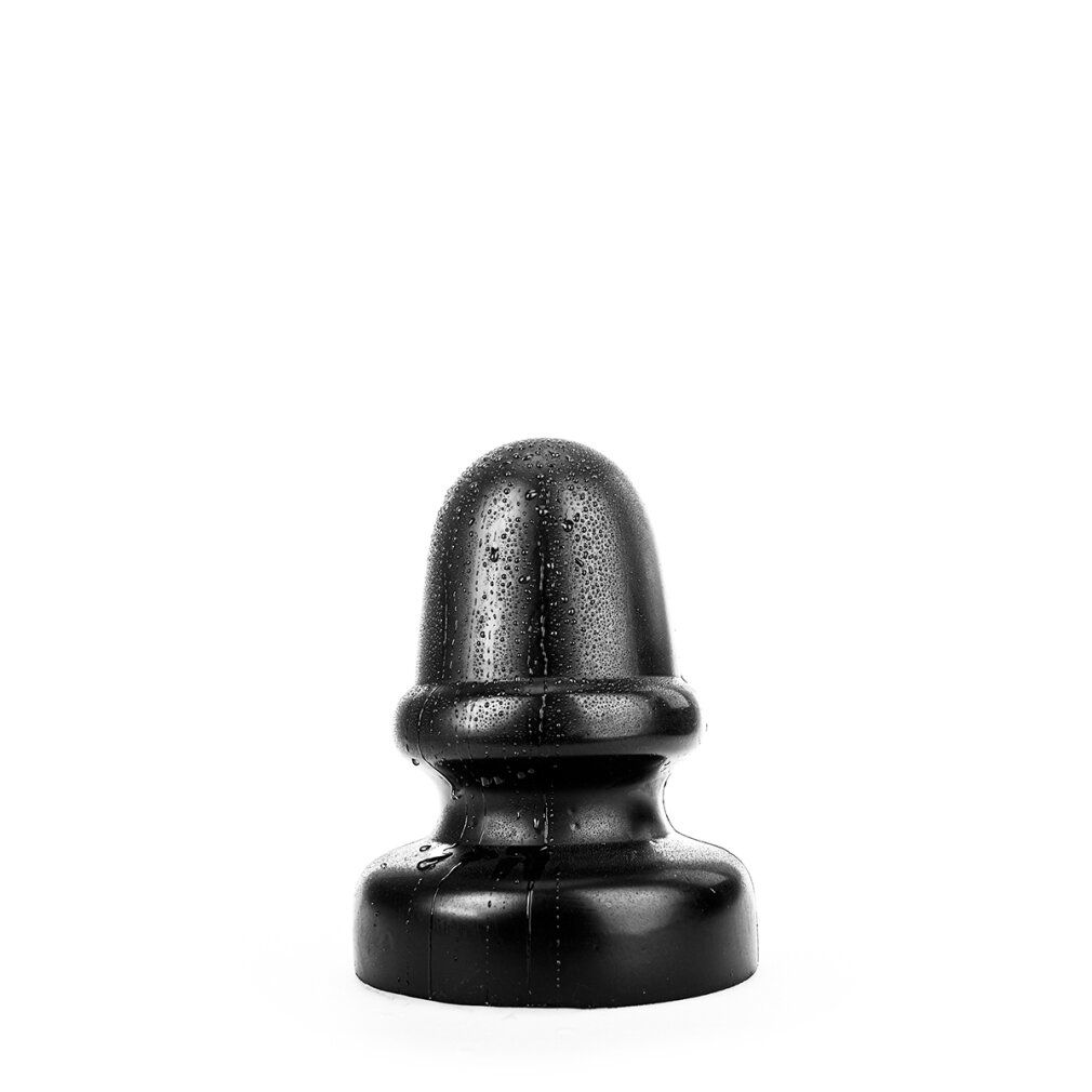 Plug anal noir avec des gouttes d'eau.