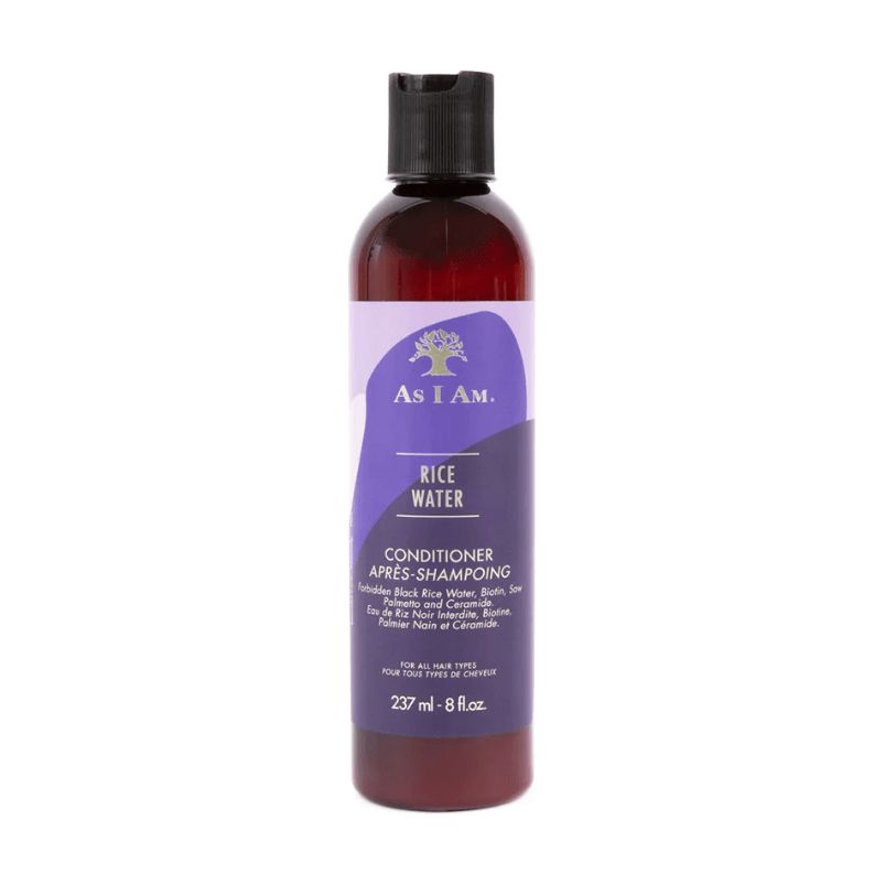 Fles haarconditioner. Paars etiket met tekst en logo. Zwarte dop. 237 ml.
