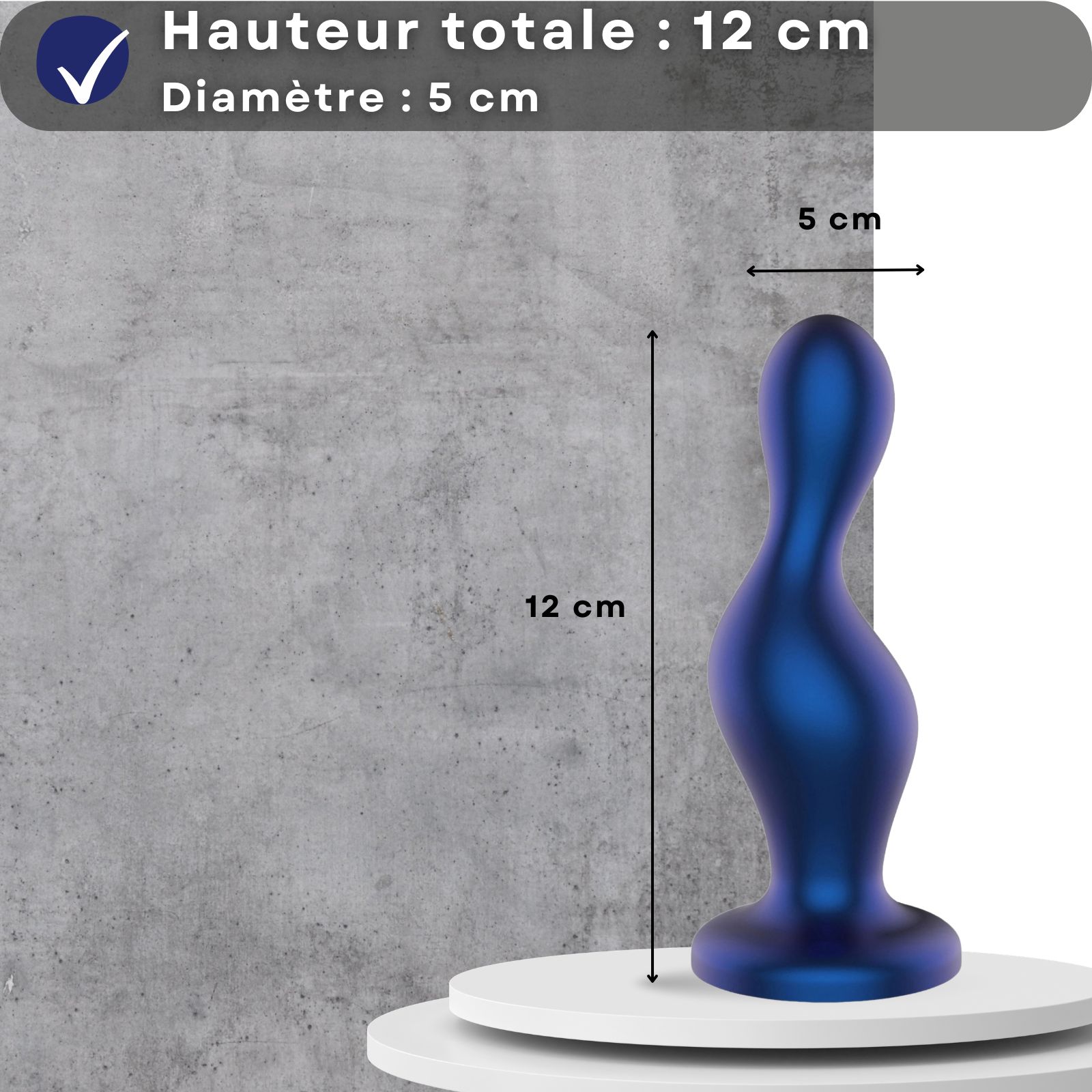 Plug anal bleu, 12 cm de haut, 5 cm de diamètre. Sur socle.